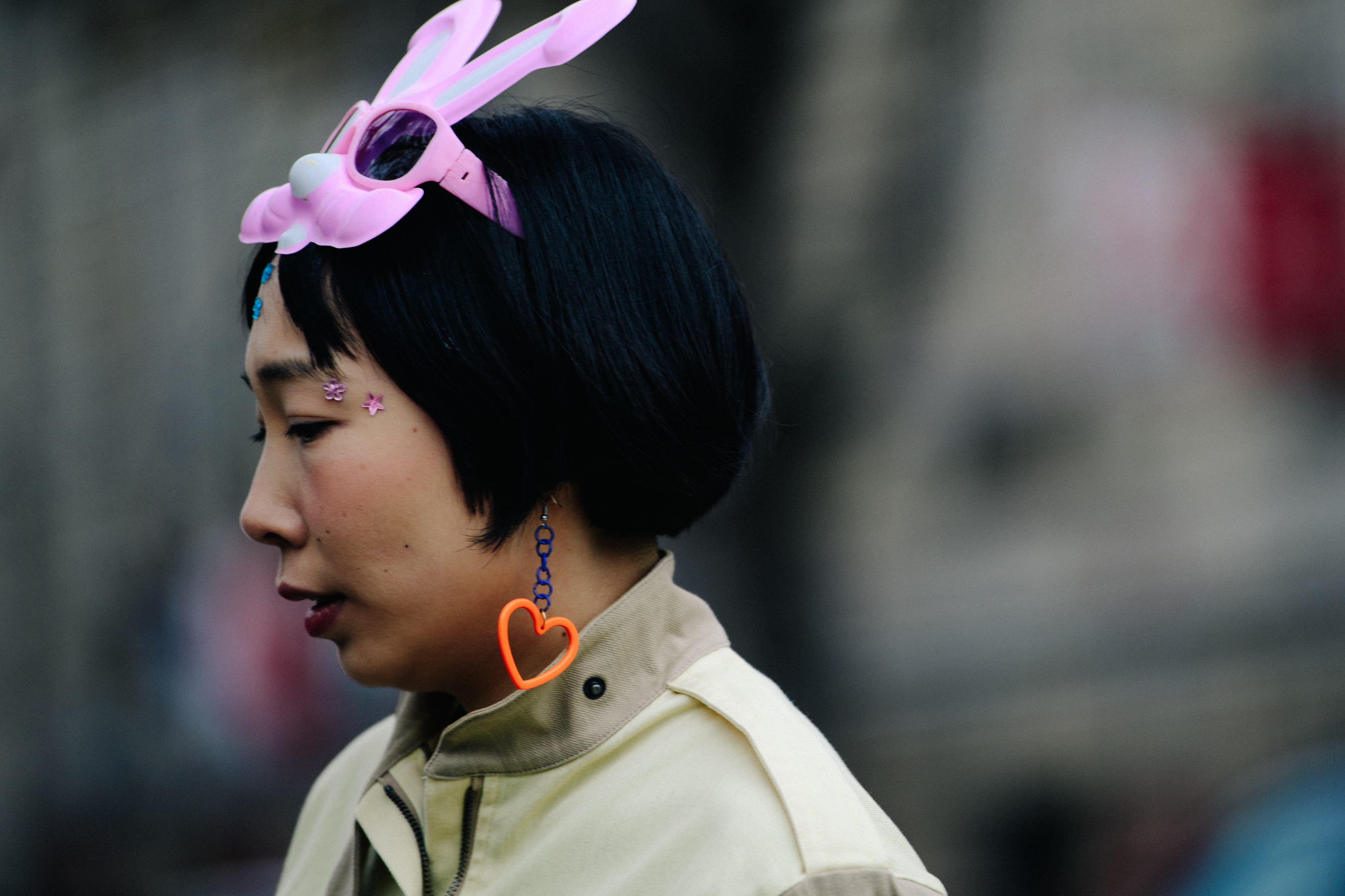 Woman wearing pink bunny glasses
