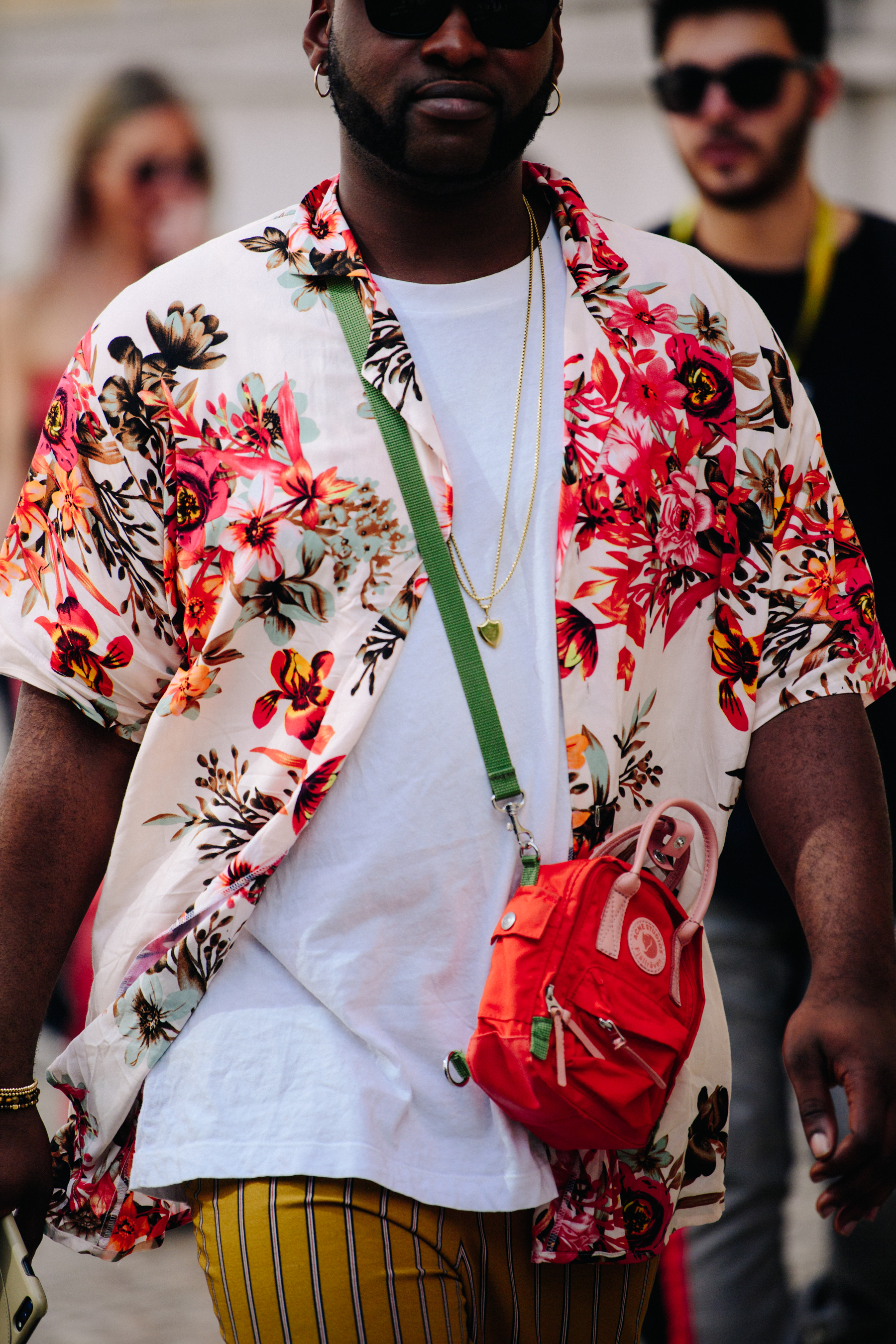 Man wearing Acne Studios x Fjallraven bag