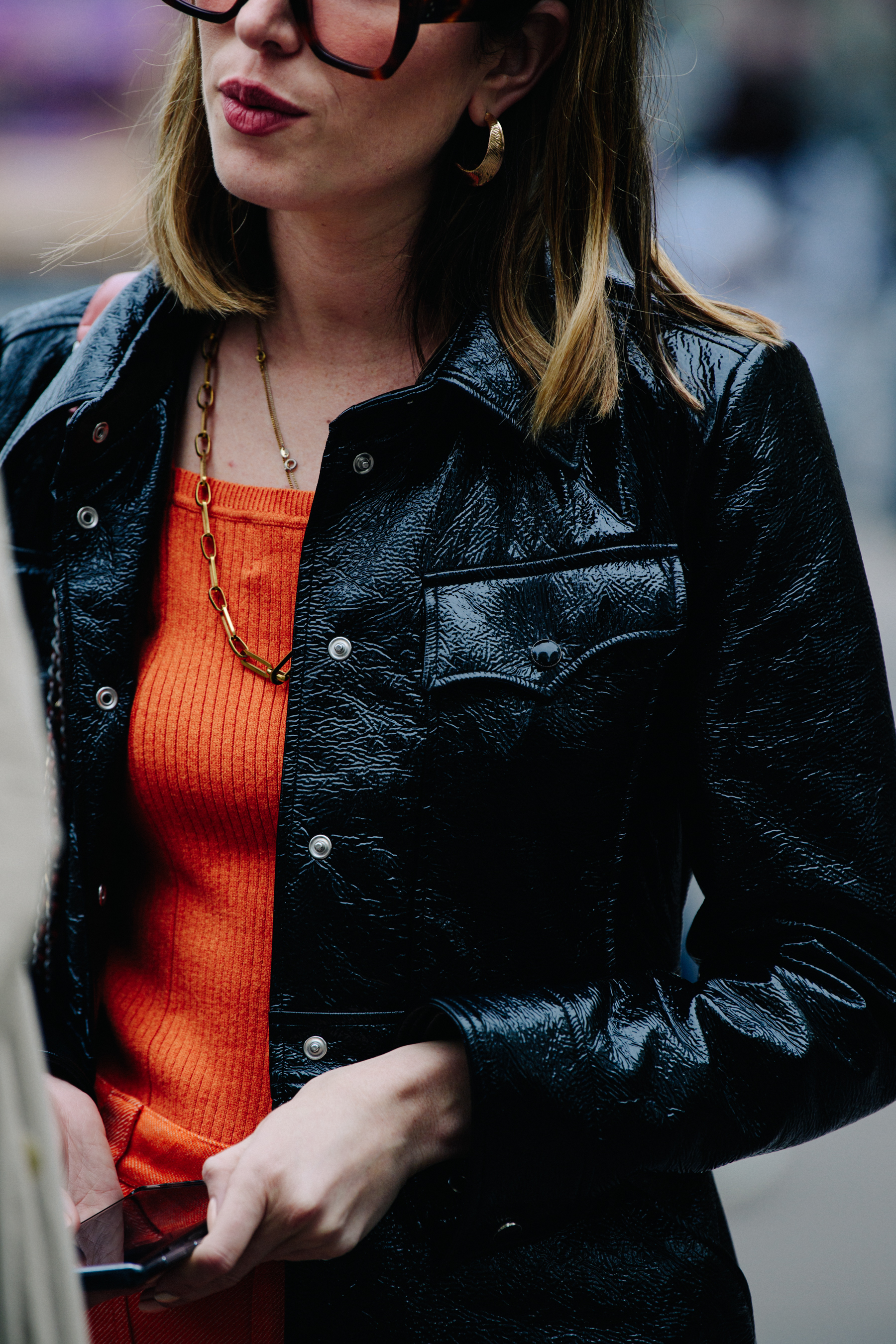 Woman wearing orange top
