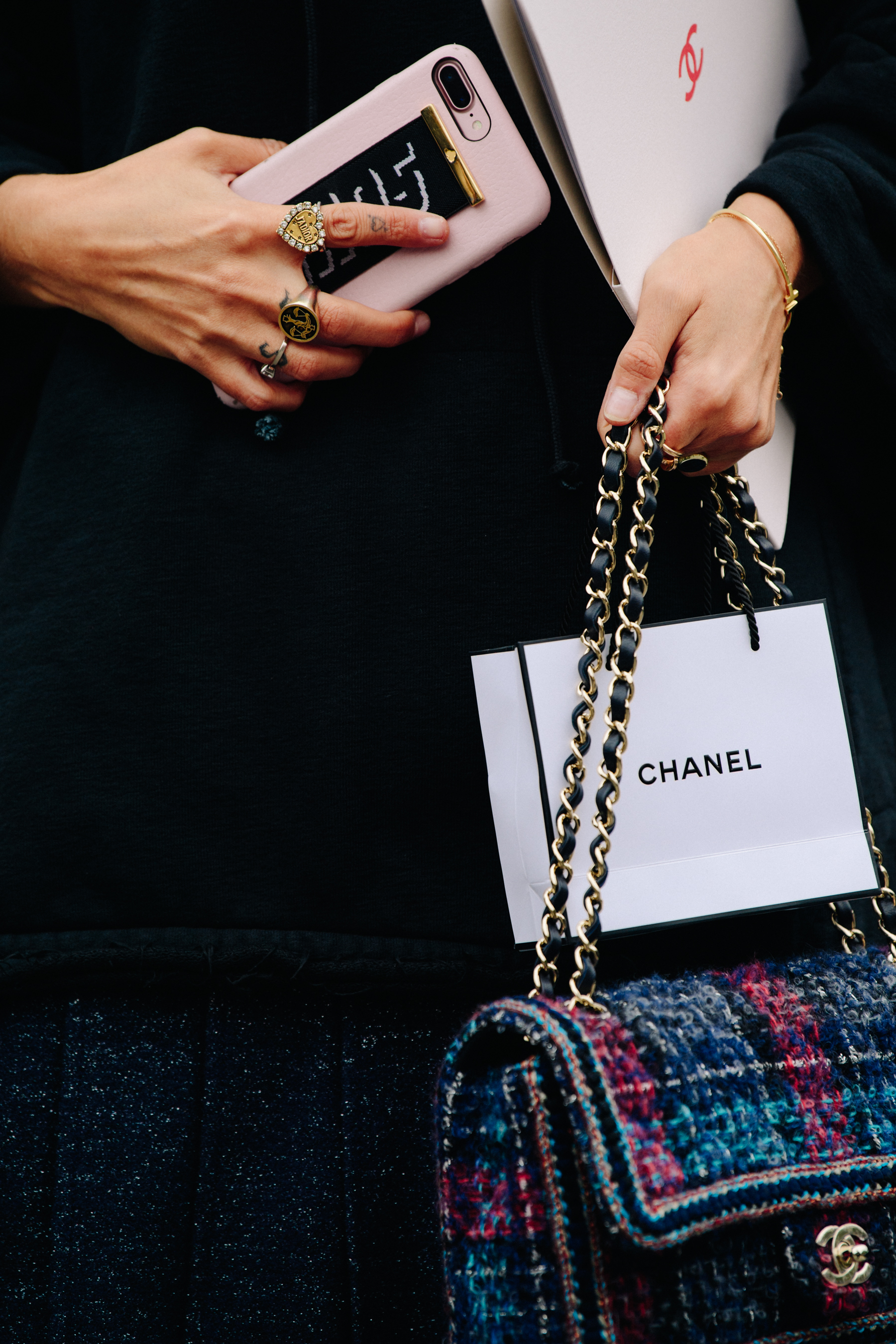 Woman carrying Chanel bag