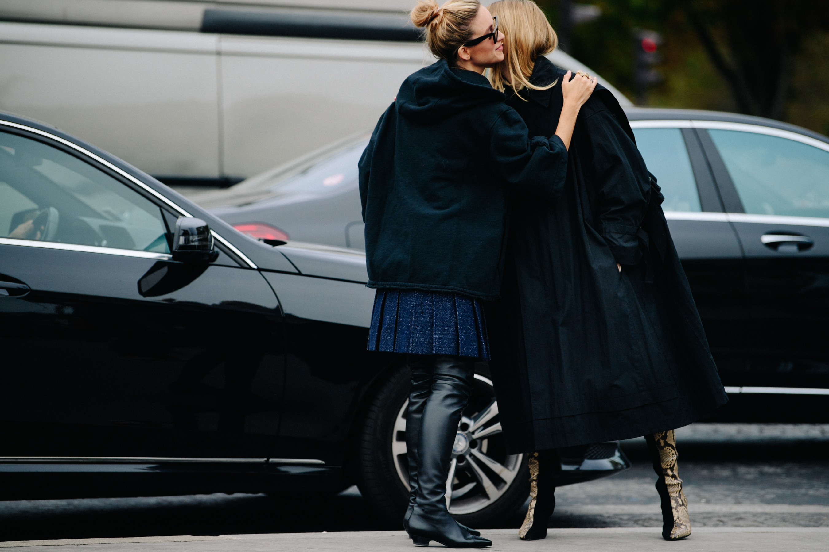 Two bloggers wearing black jackets