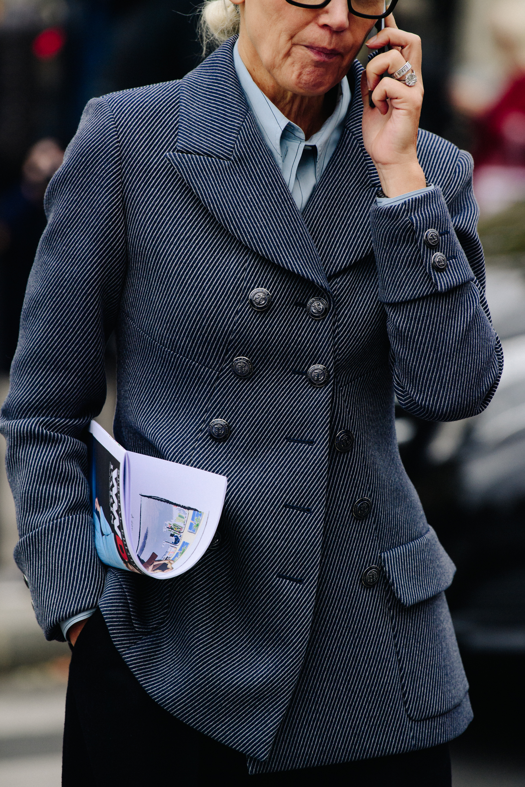 Woman wearing striped coat