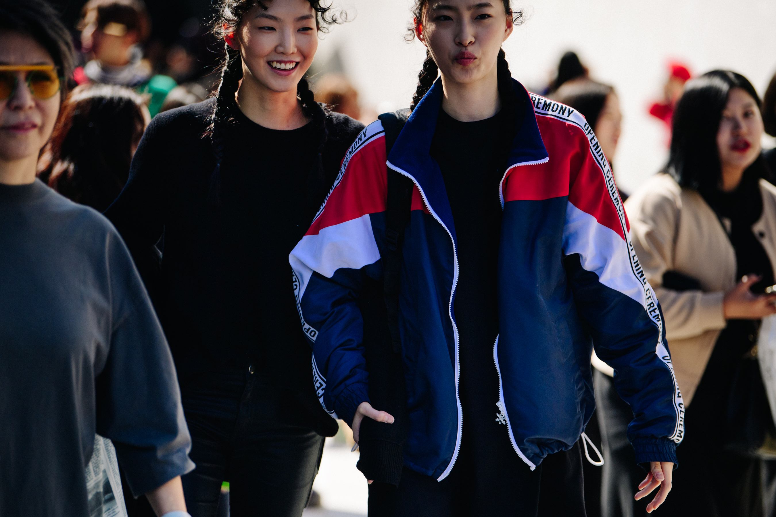 Two Asian models with pigtails