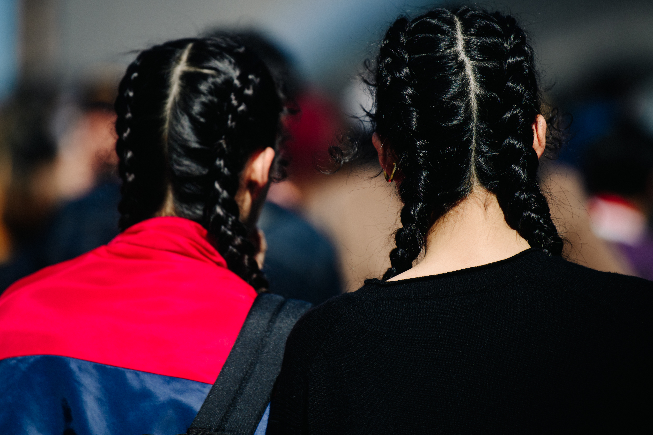 Two Asian models with pigtails
