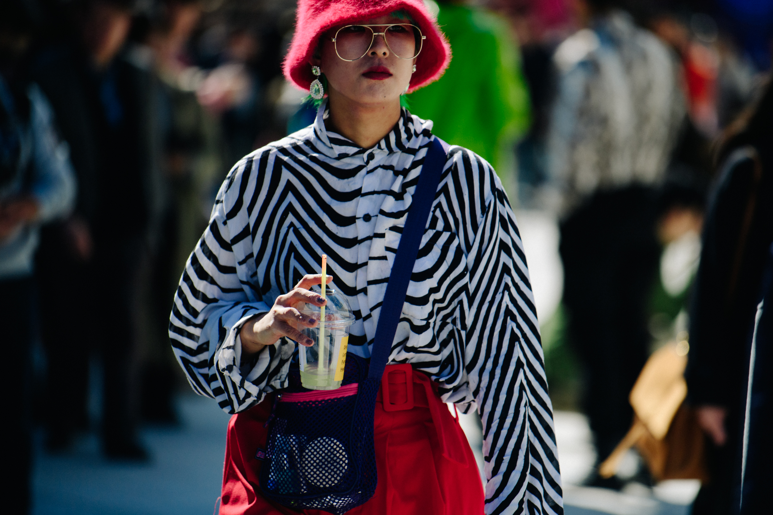 Asian woman wearing red hat