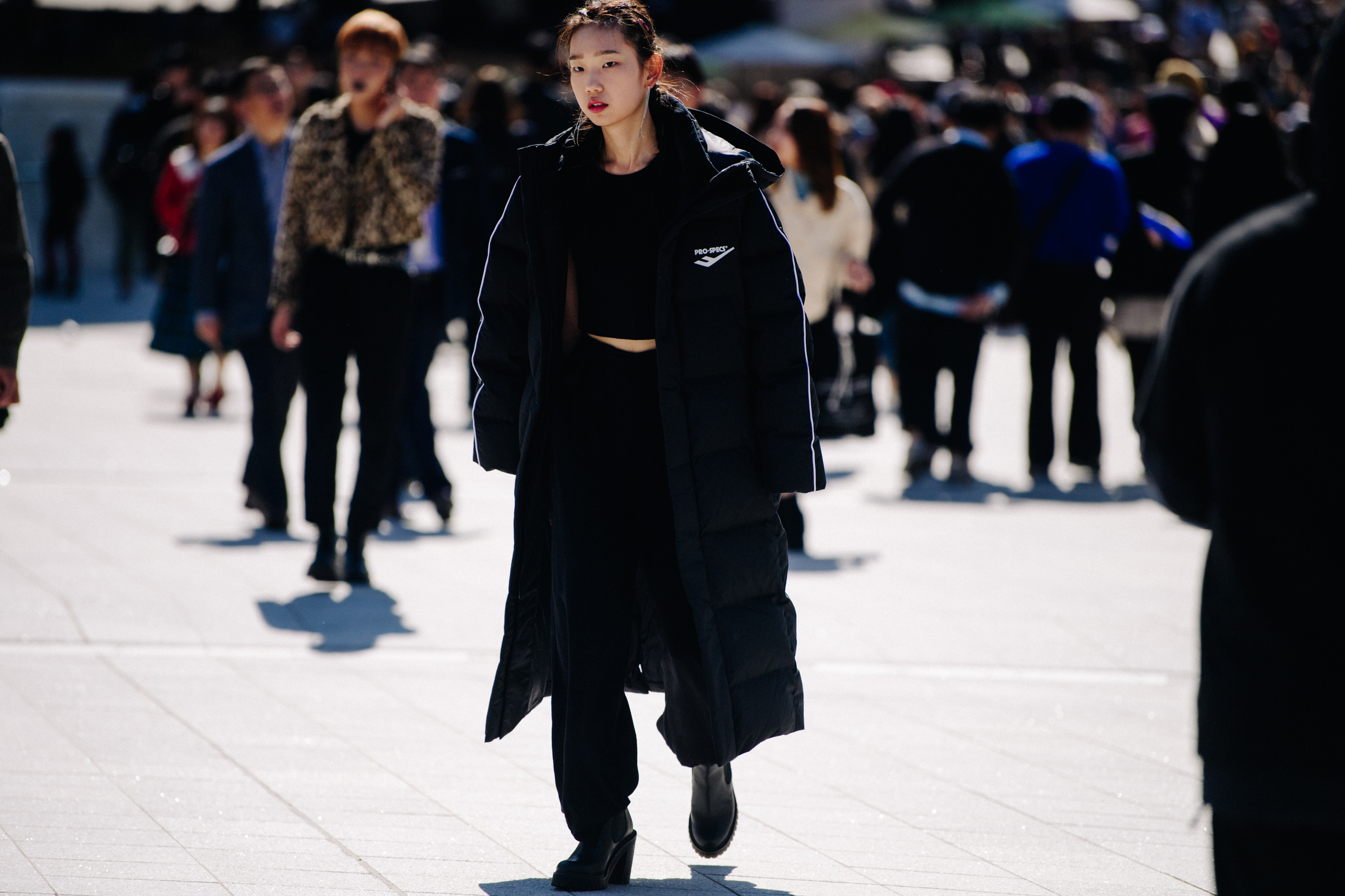 Woman wearing black winter outfit