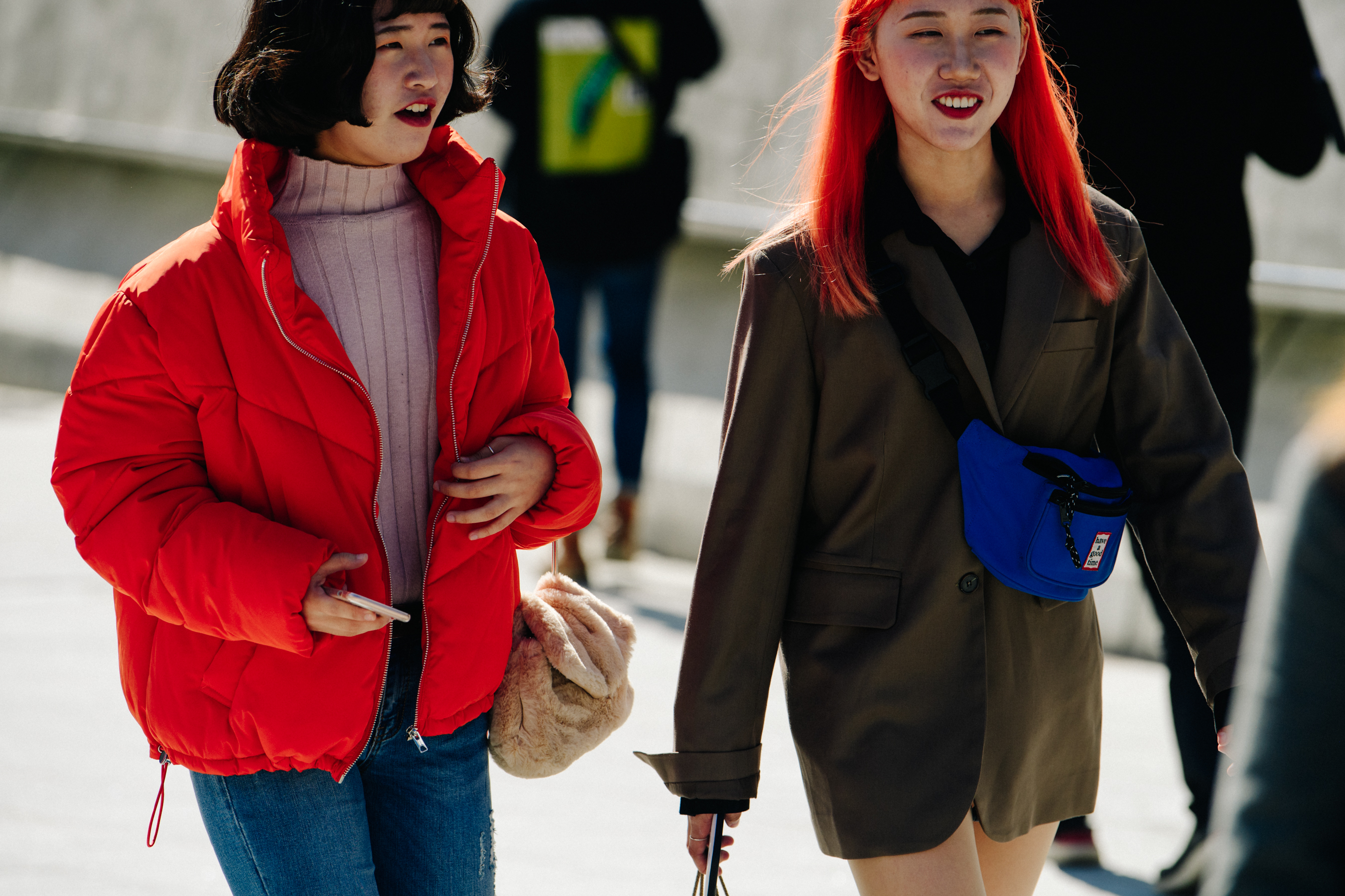 Two women wearing winter jackets