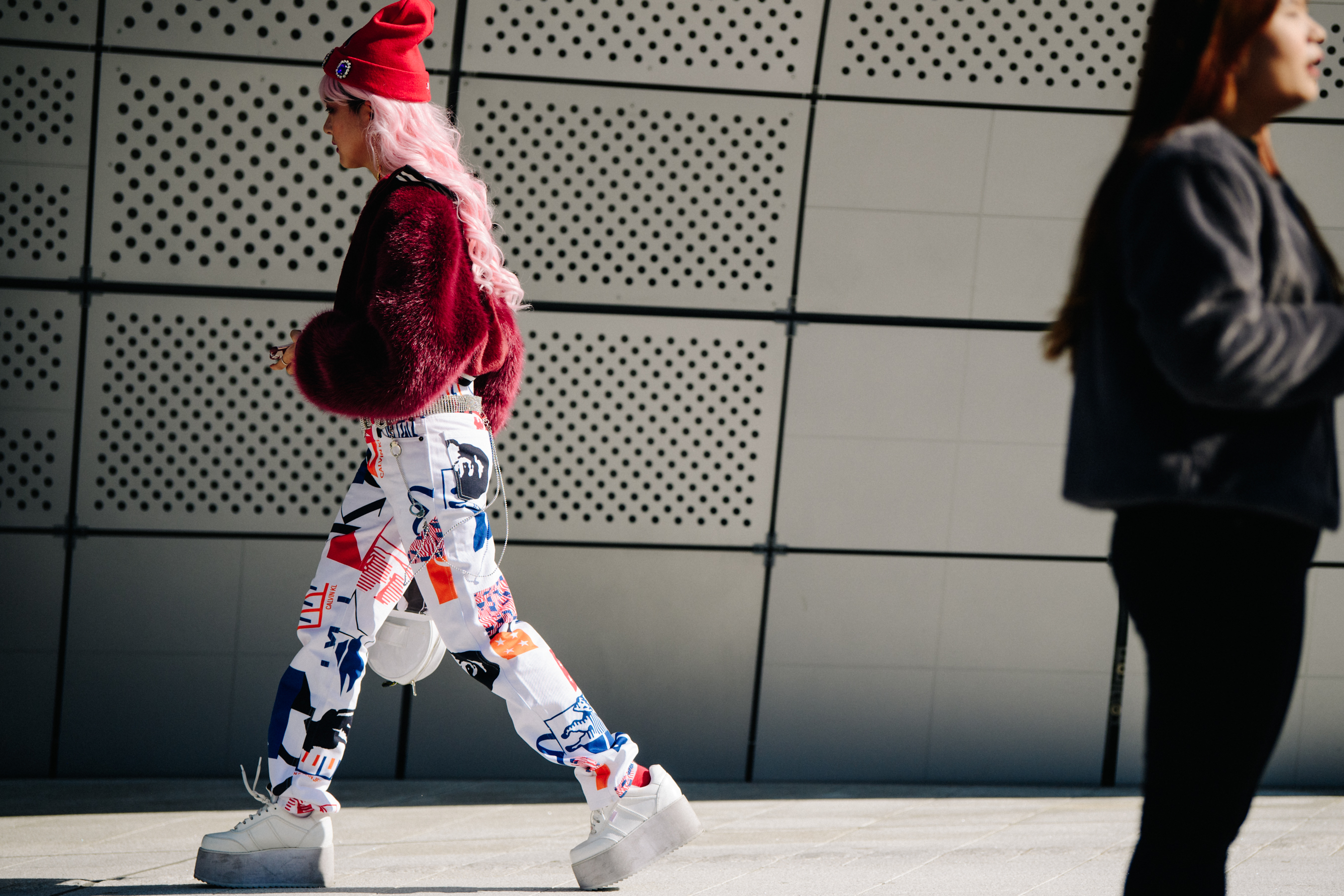Woman wearing white jeans