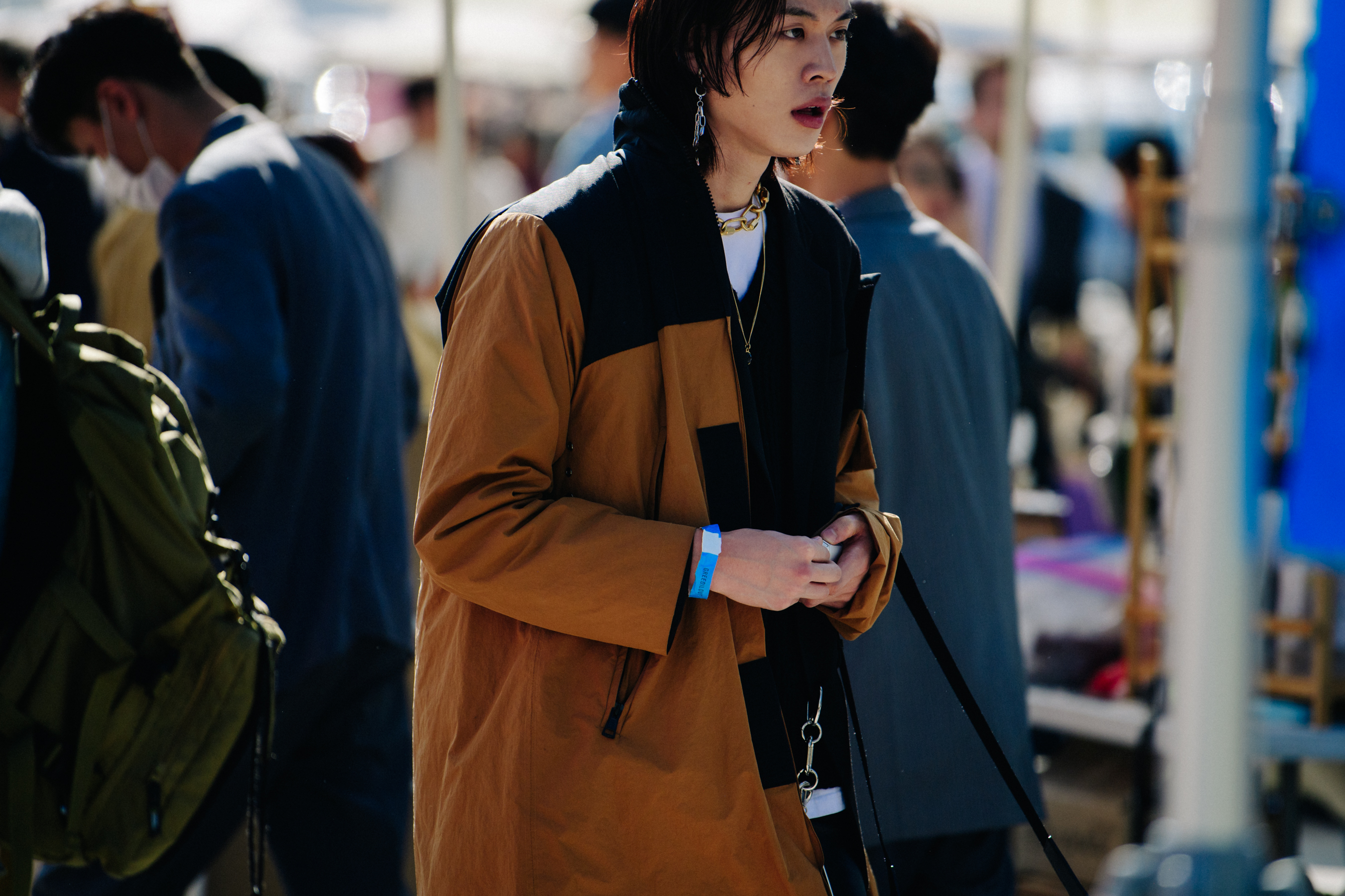 Man wearing brown coat