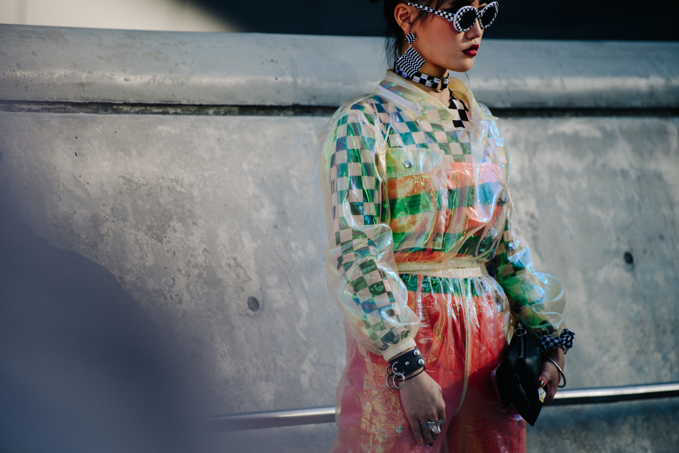 Woman wearing colourful plastic outfit