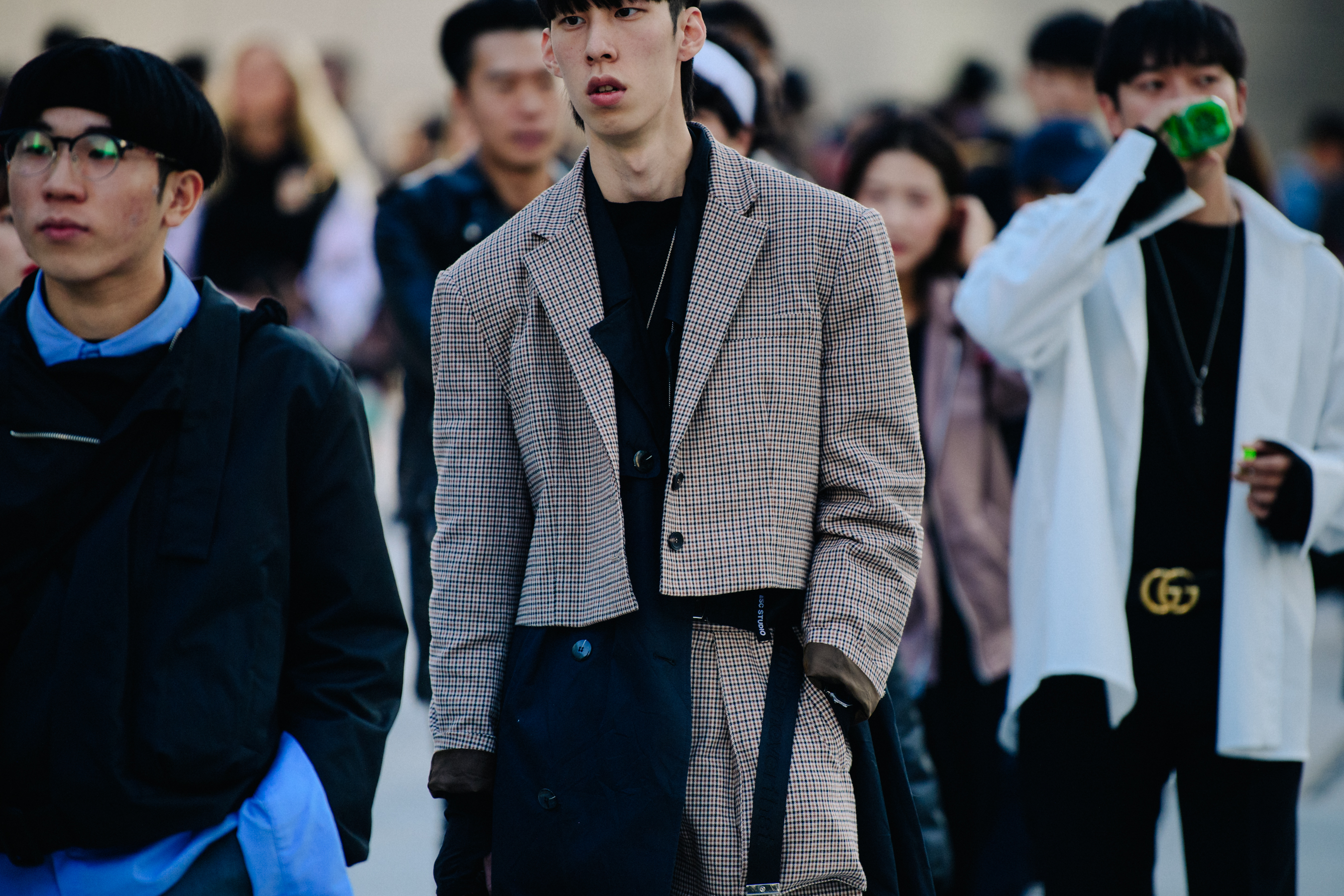 Man wearing check wool coat