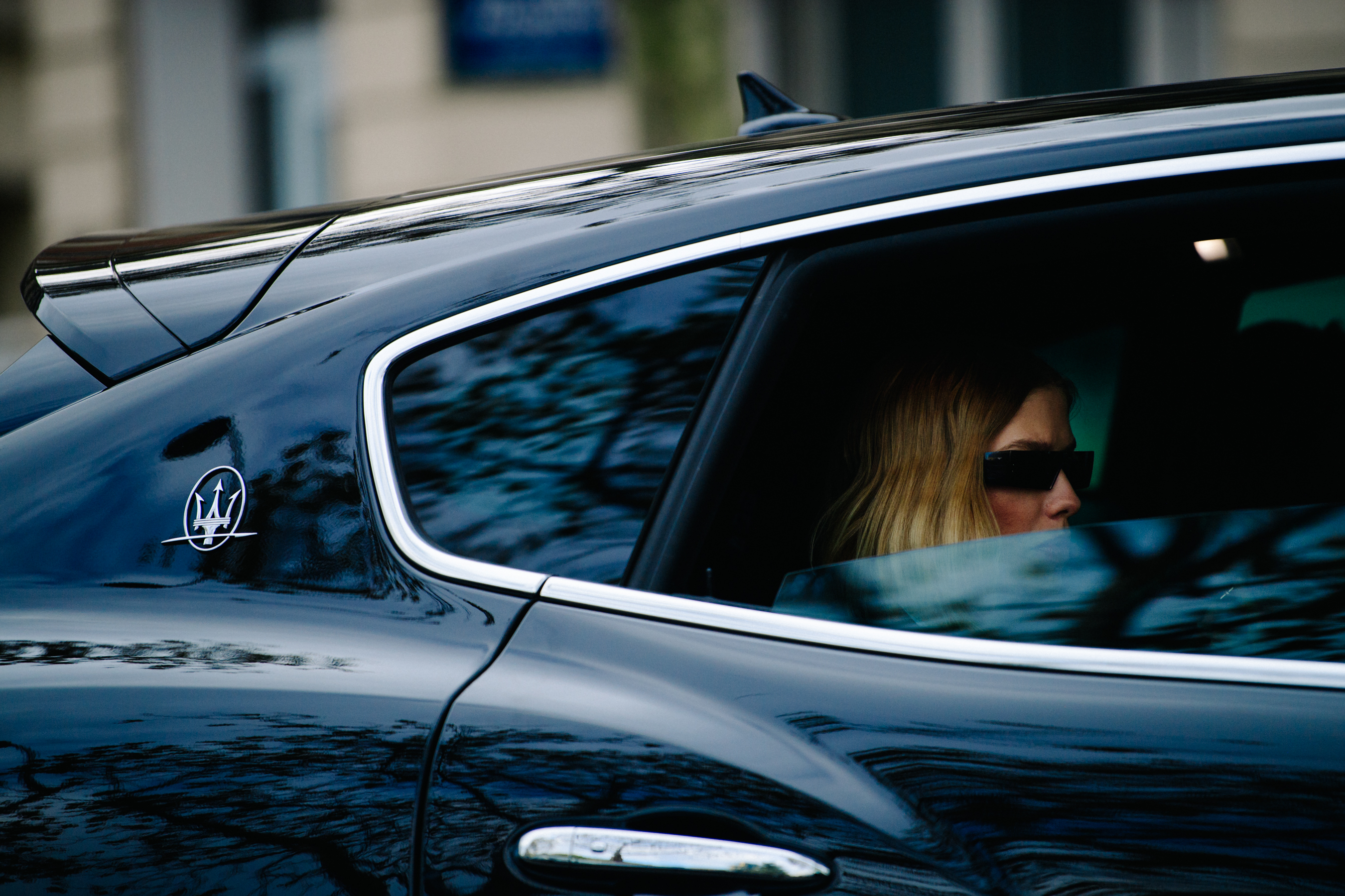Russian woman in Maserati
