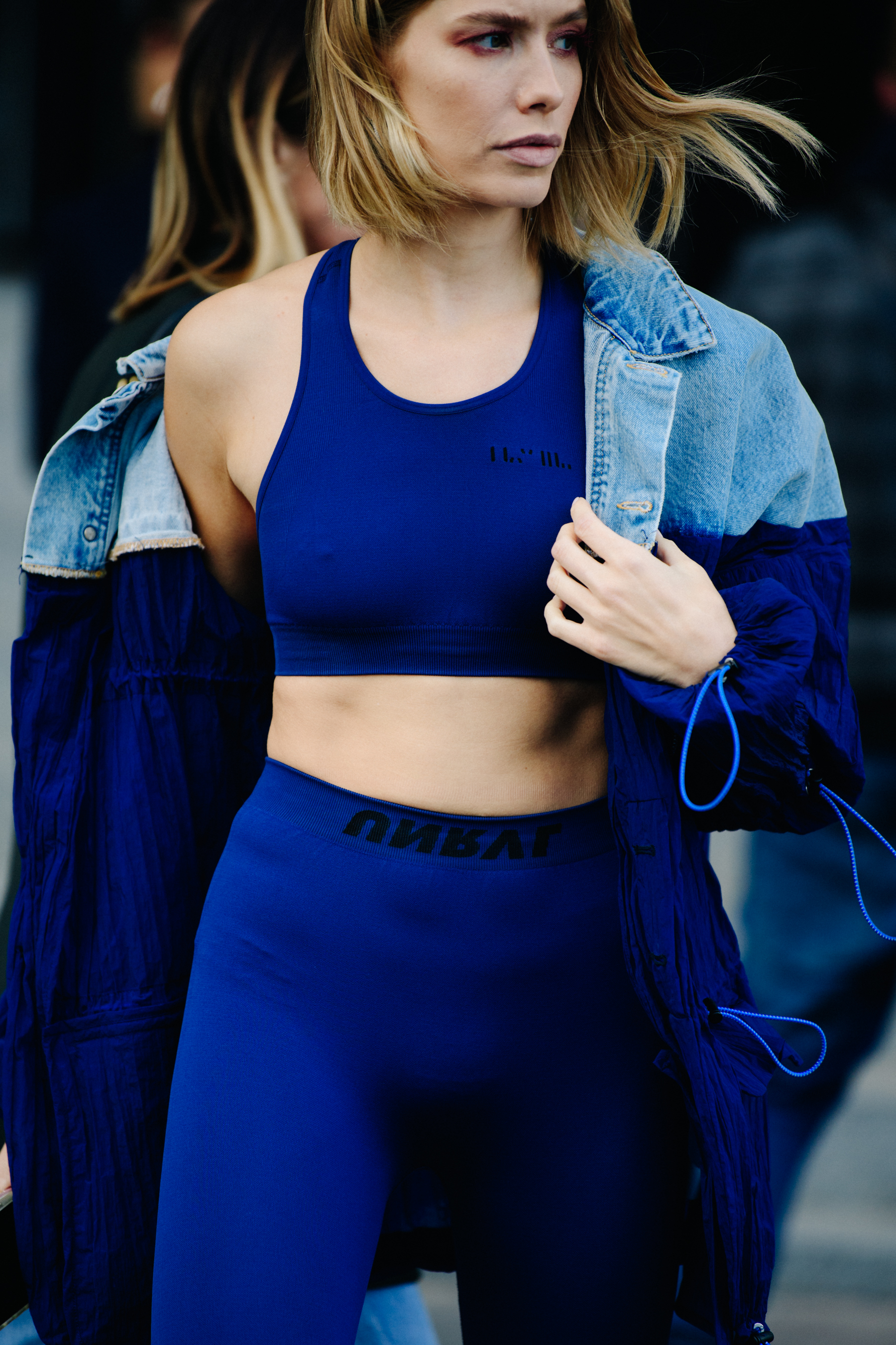 Woman wearing blue sports outfit