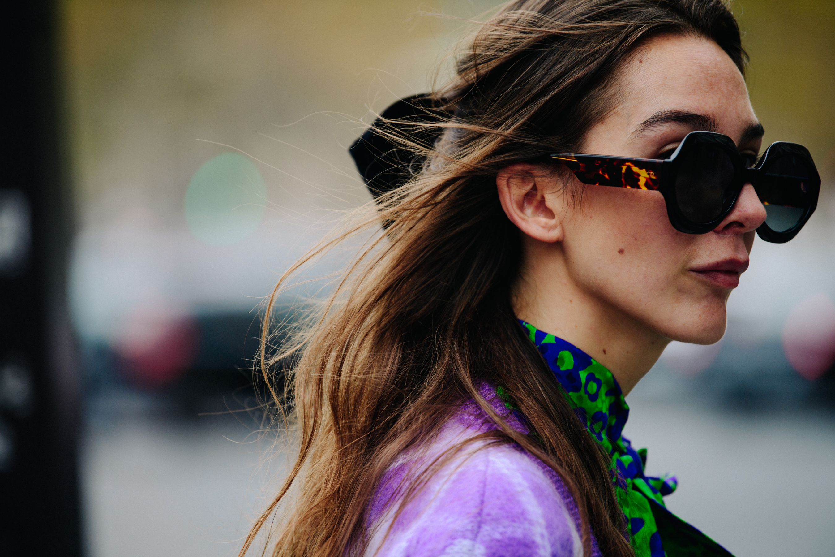 Woman wearing colourful shirt