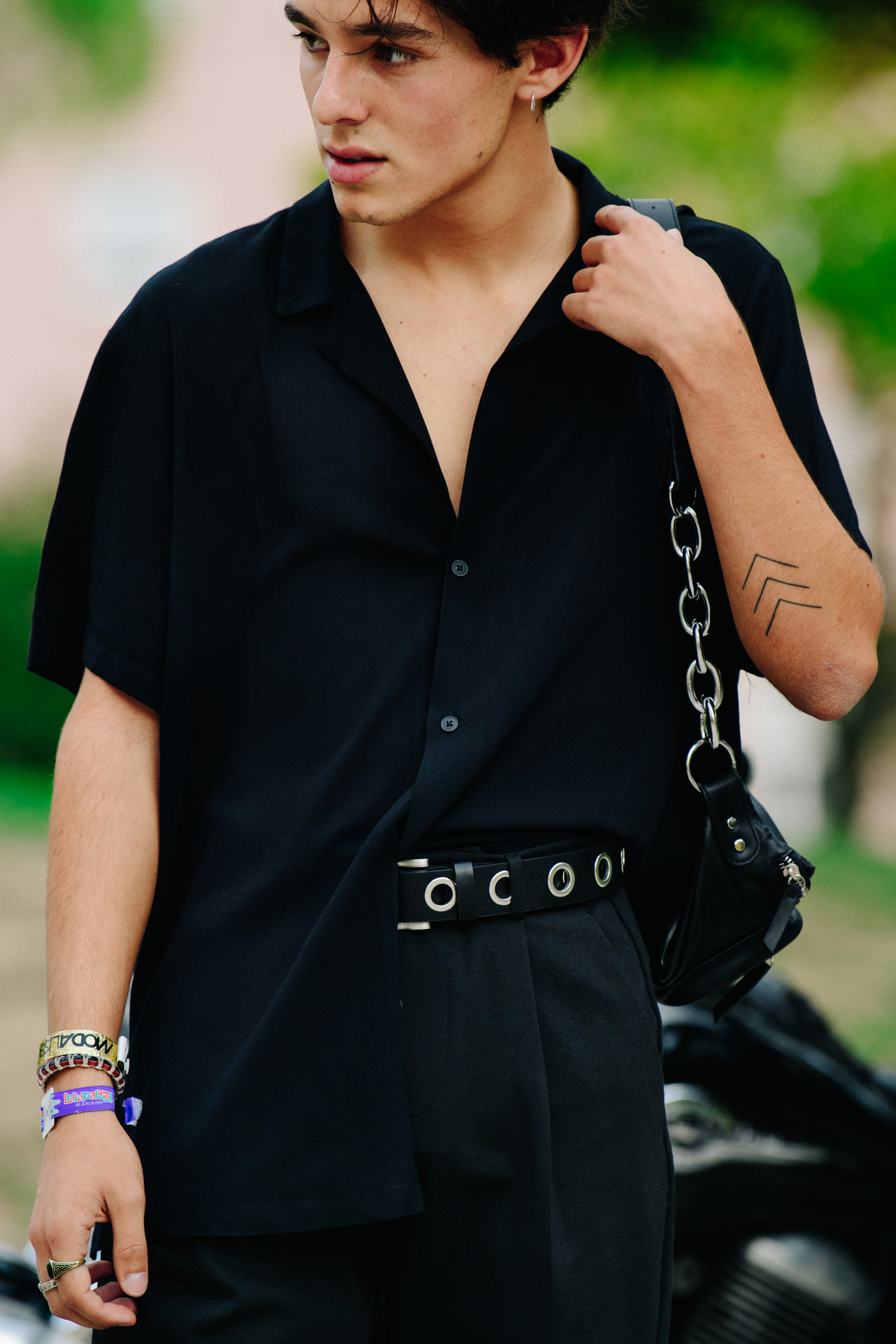 Man wearing black shirt and trousers