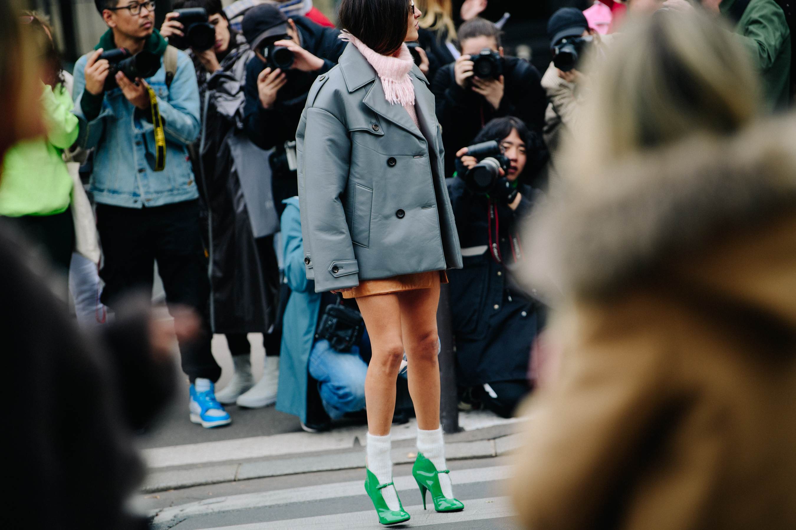 Woman wearing green heels