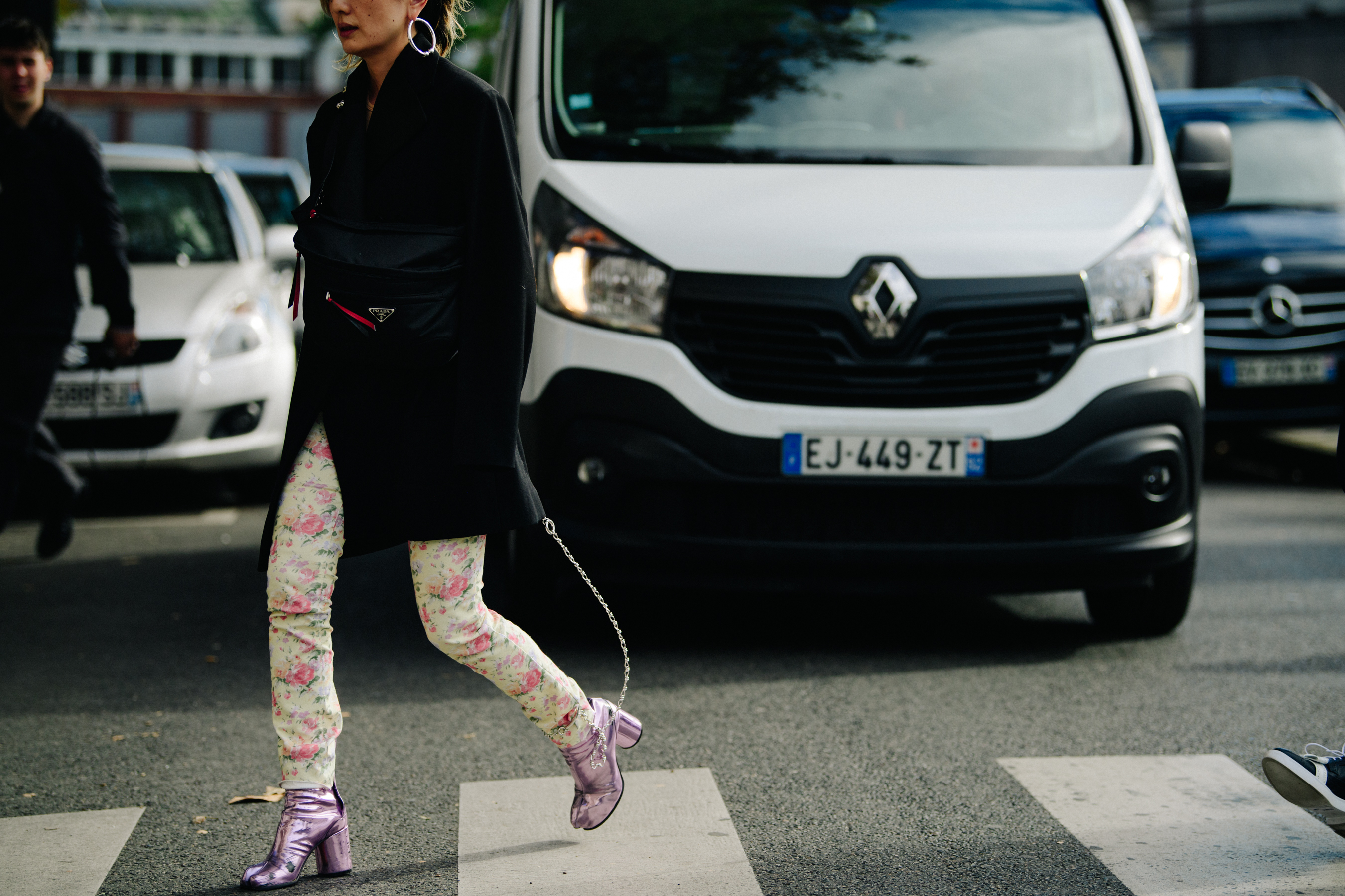 Woman carrying Prada bag