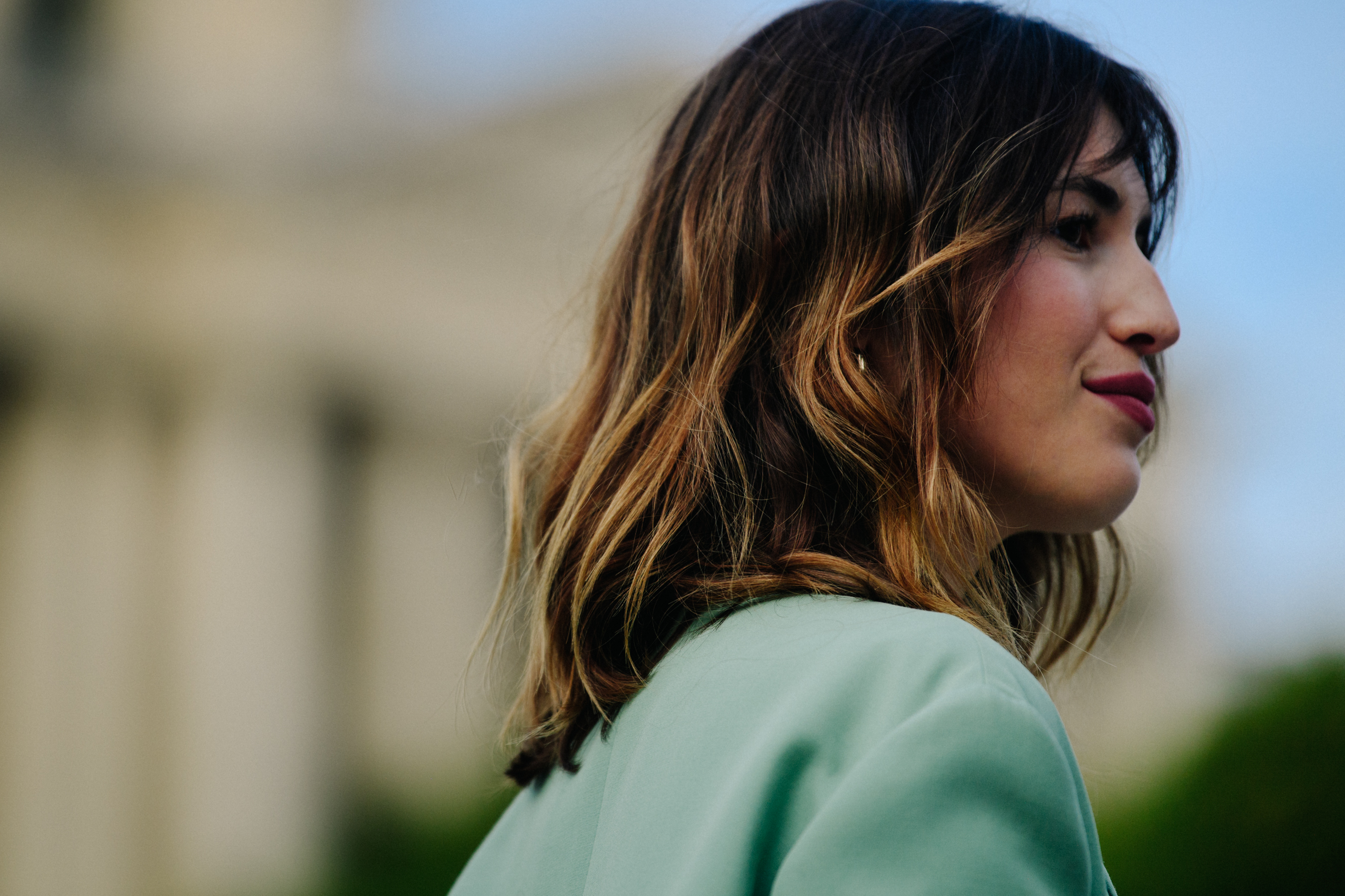 French woman wearing green