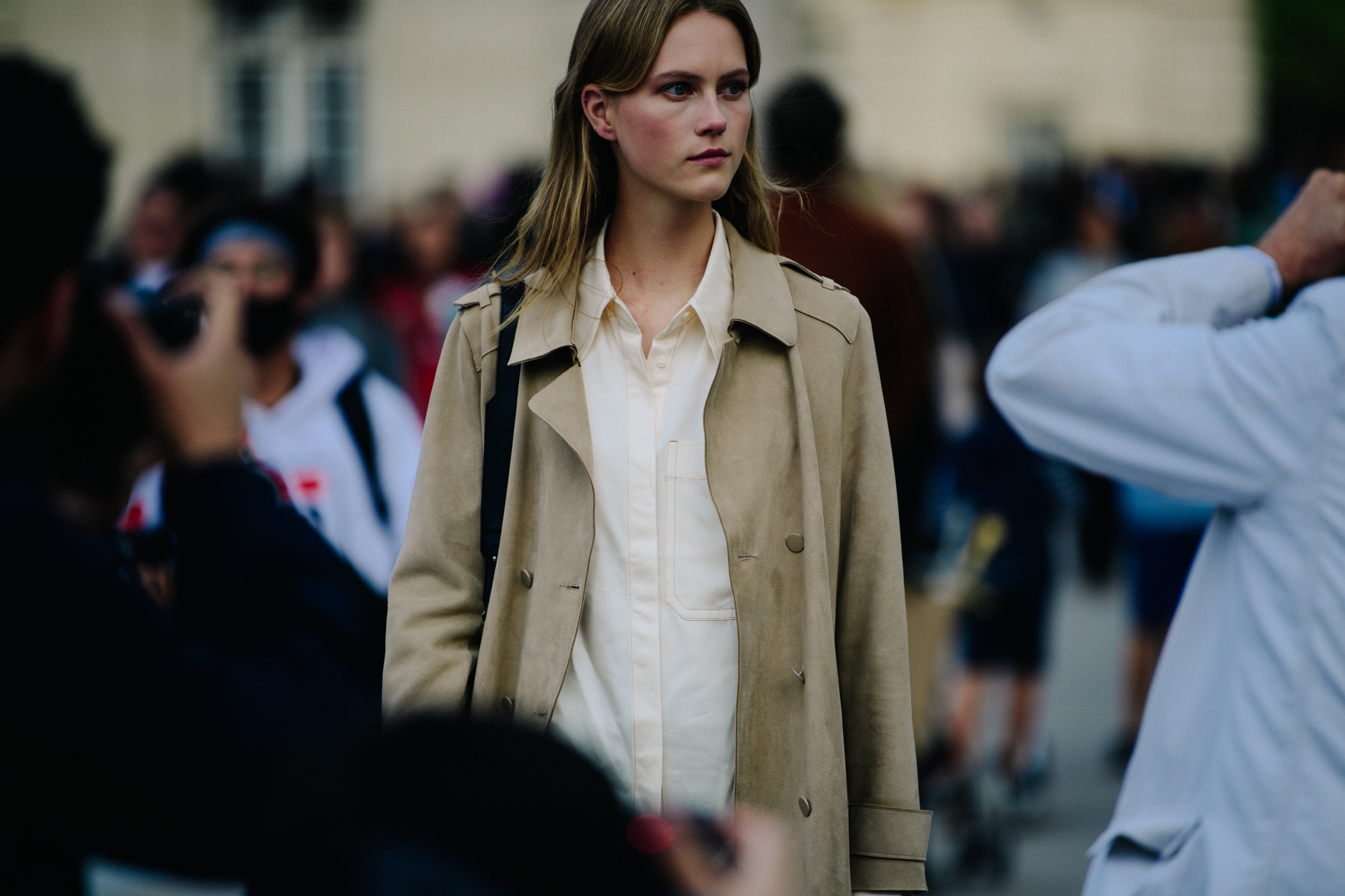Dutch model wearing tan coat
