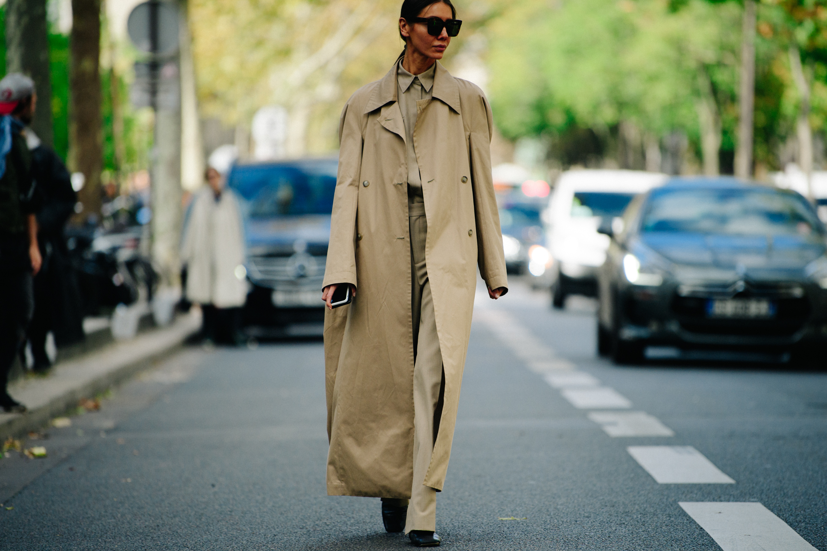 Woman wearing long tan outfit