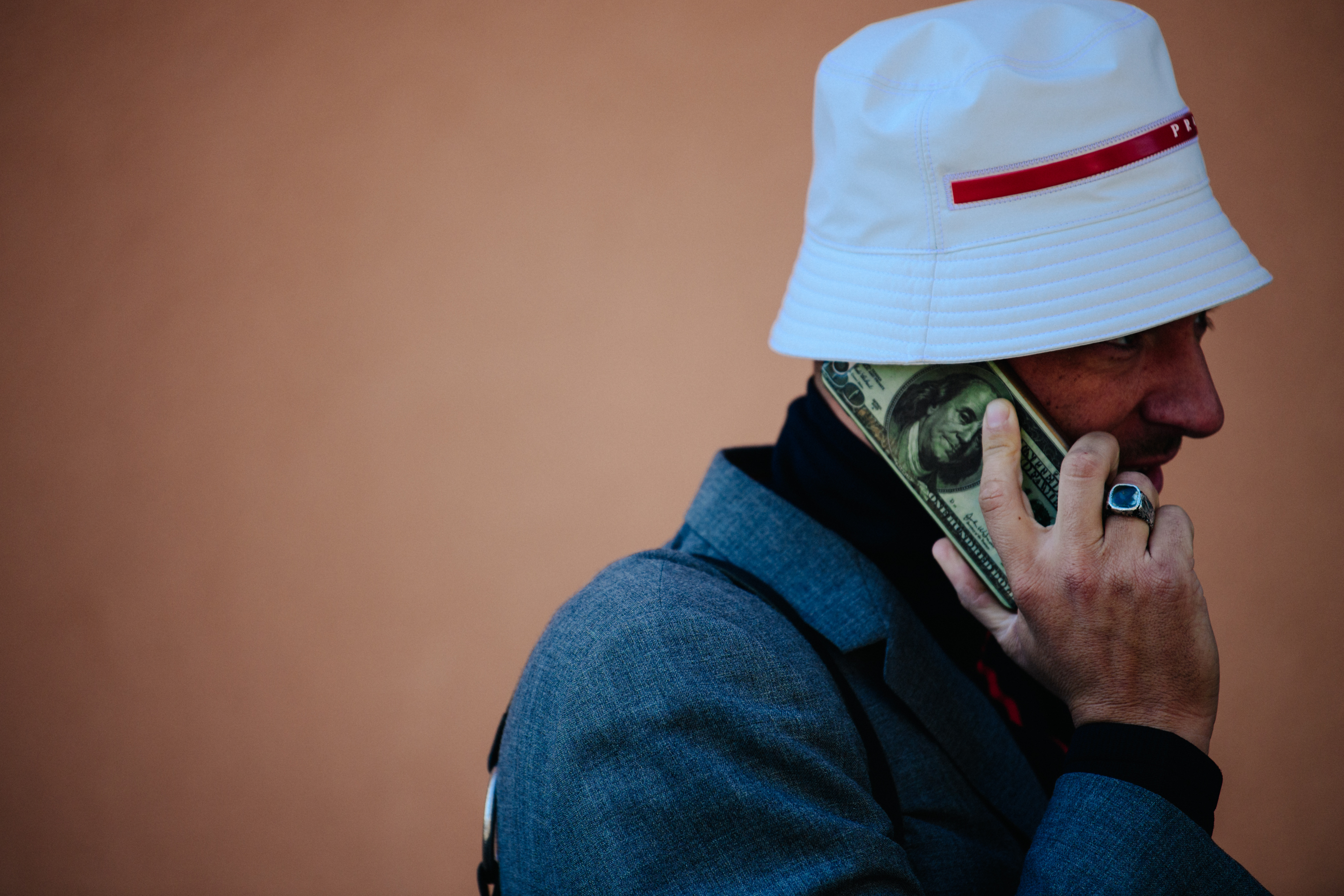 French man wearing Prada hat