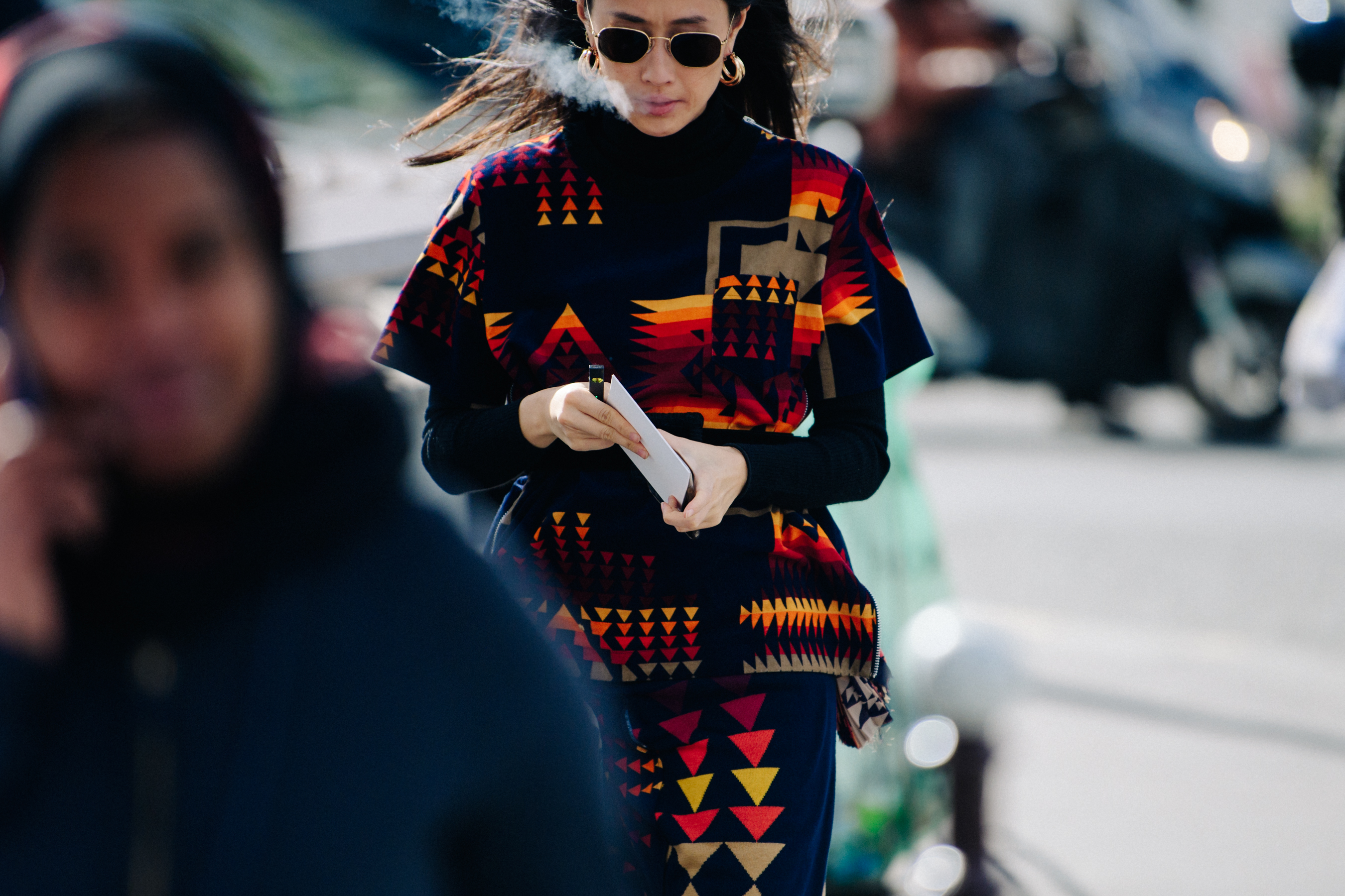Woman wearing Aztec pattern outfit