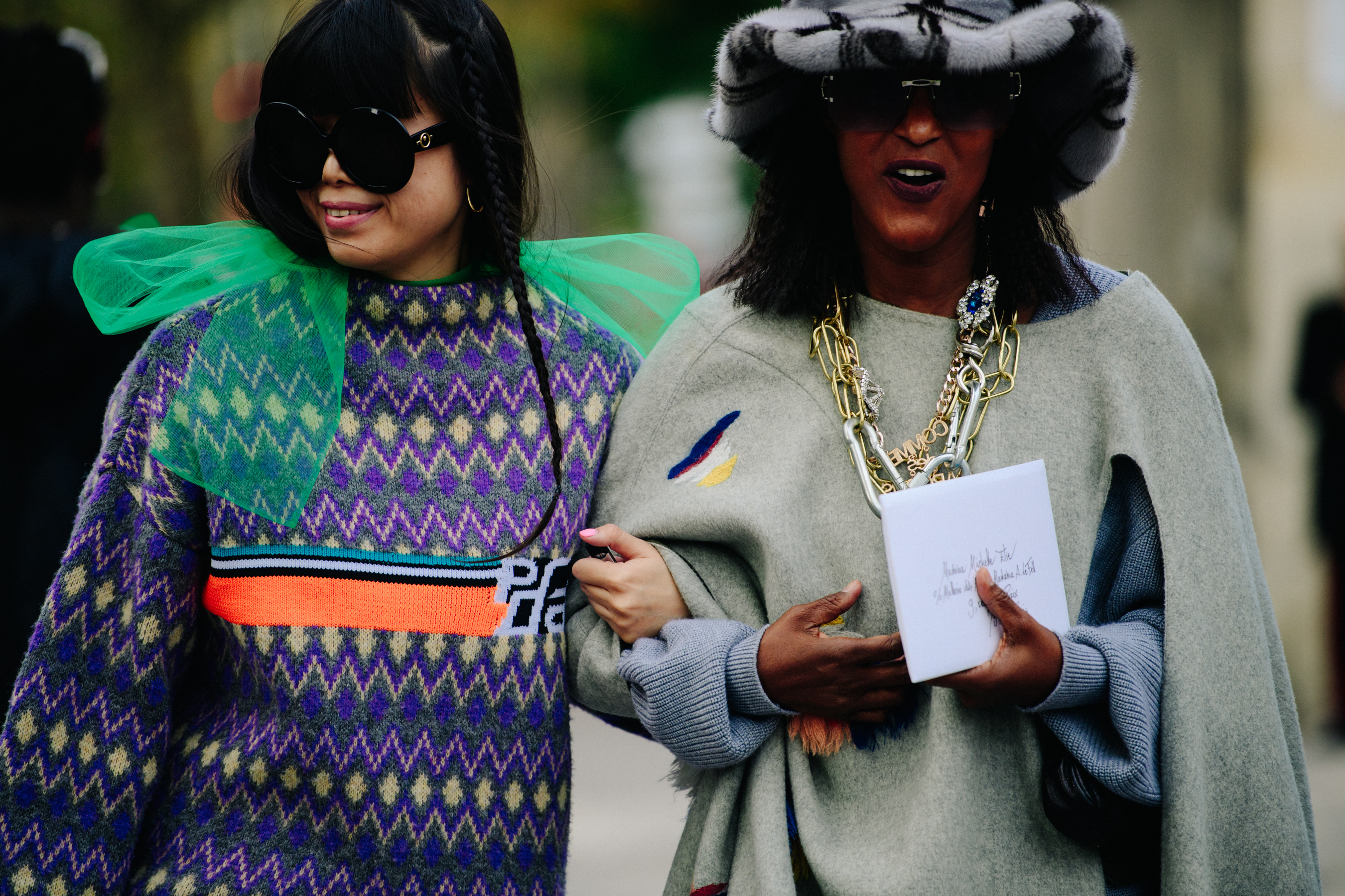 Two women wearing wool tops