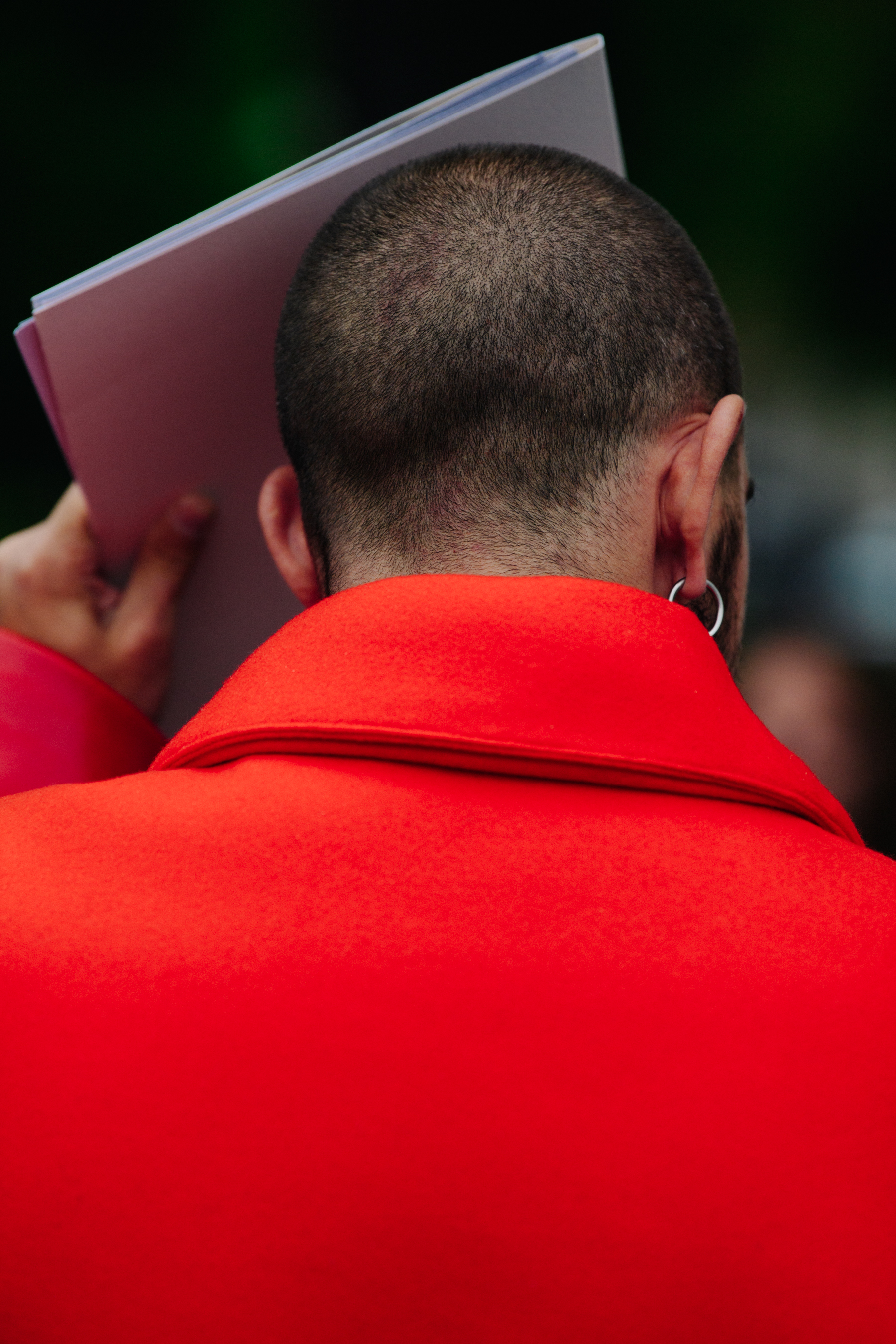 German man wearing Prada jacket