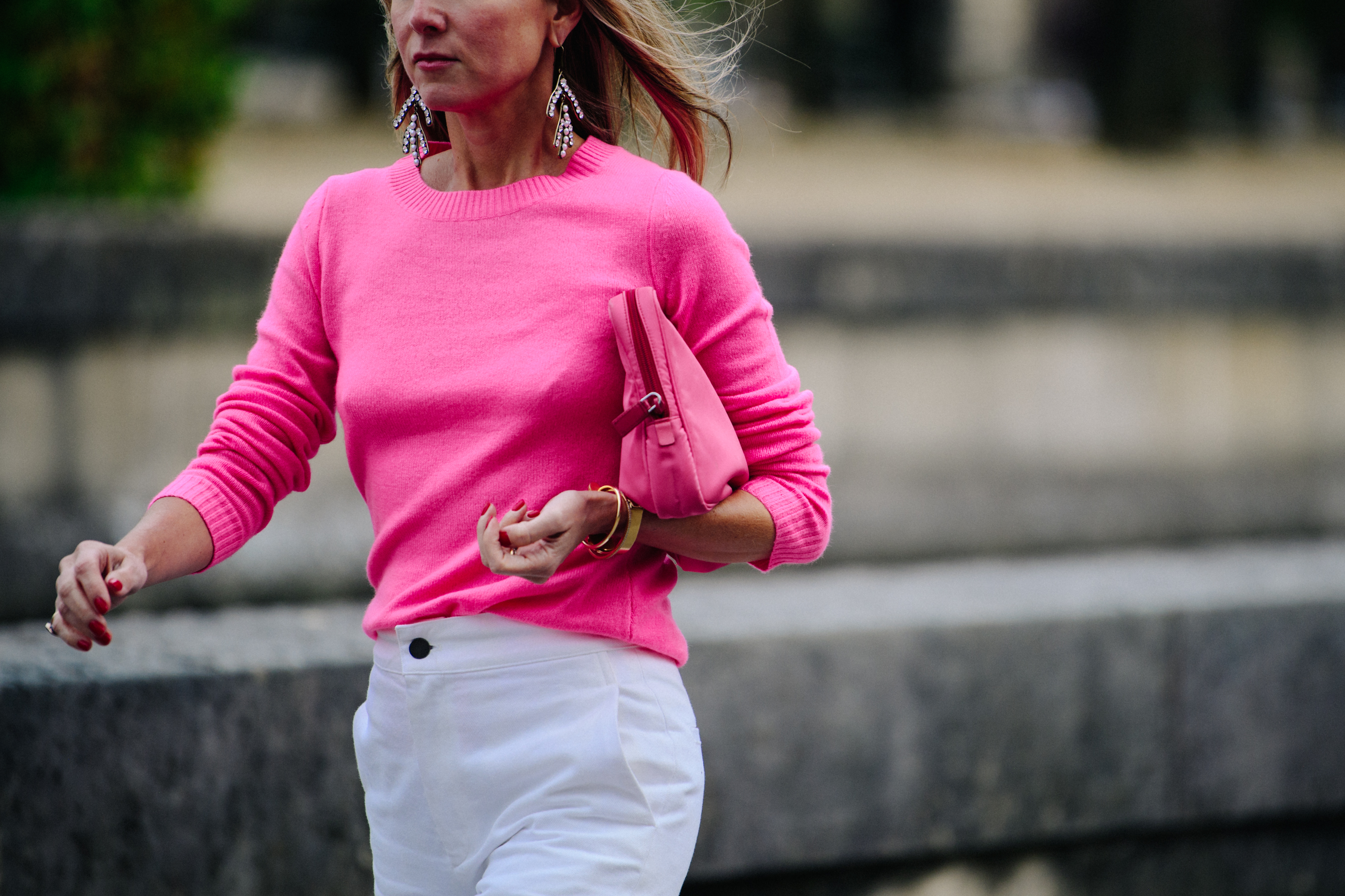 Woman wearing pink wool top