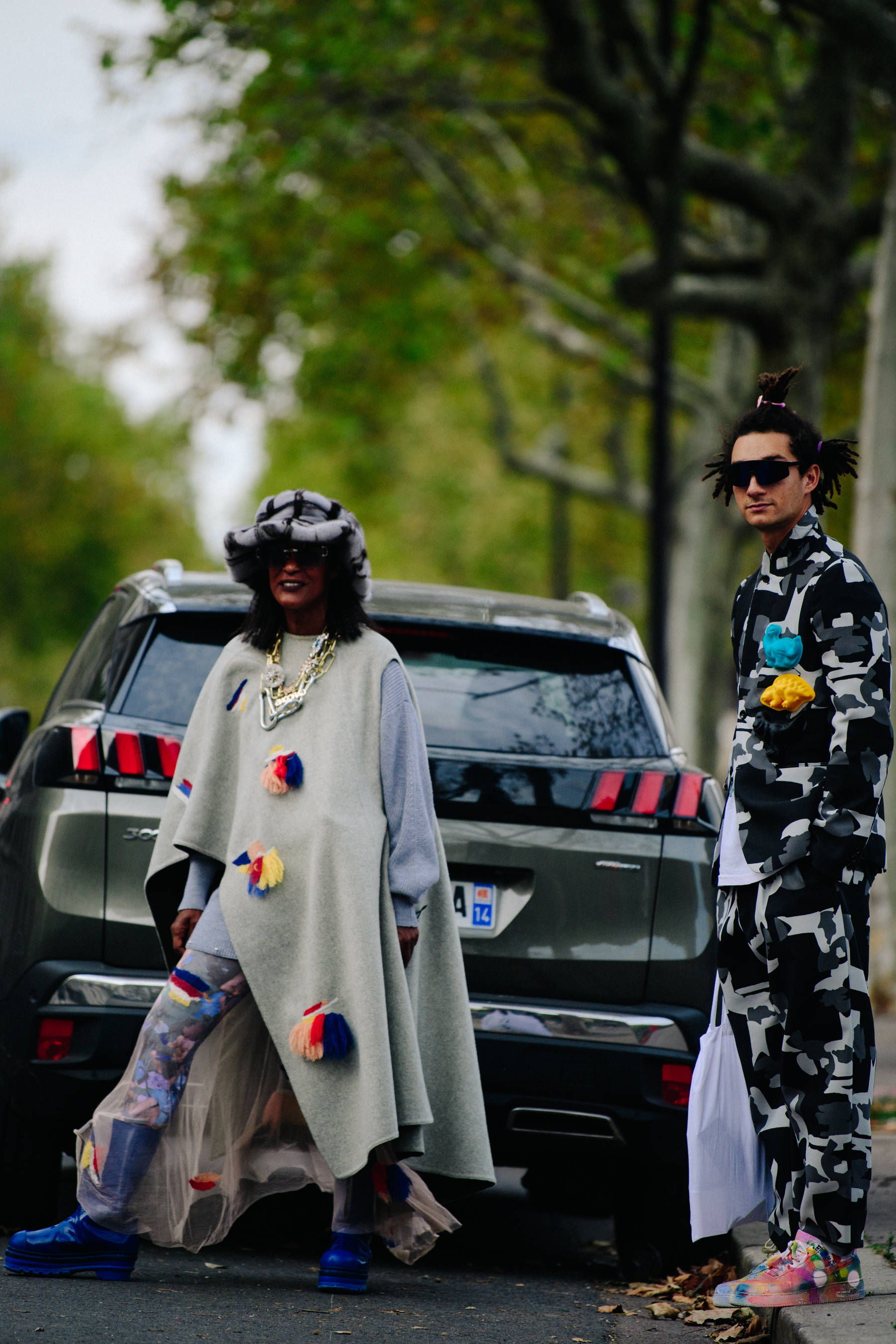 Woman and son wearing Comme des Garcons