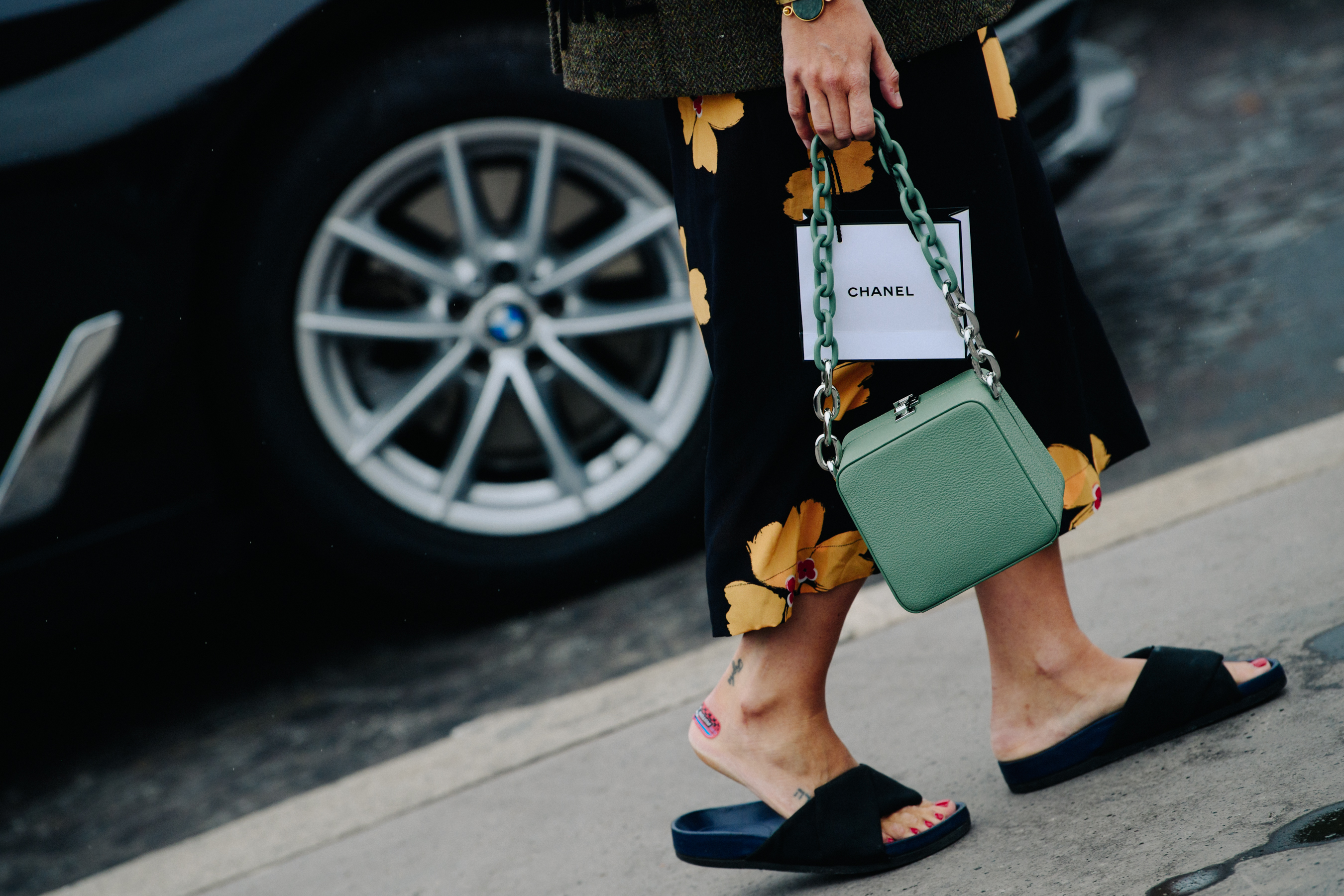 Woman carrying Chanel bag