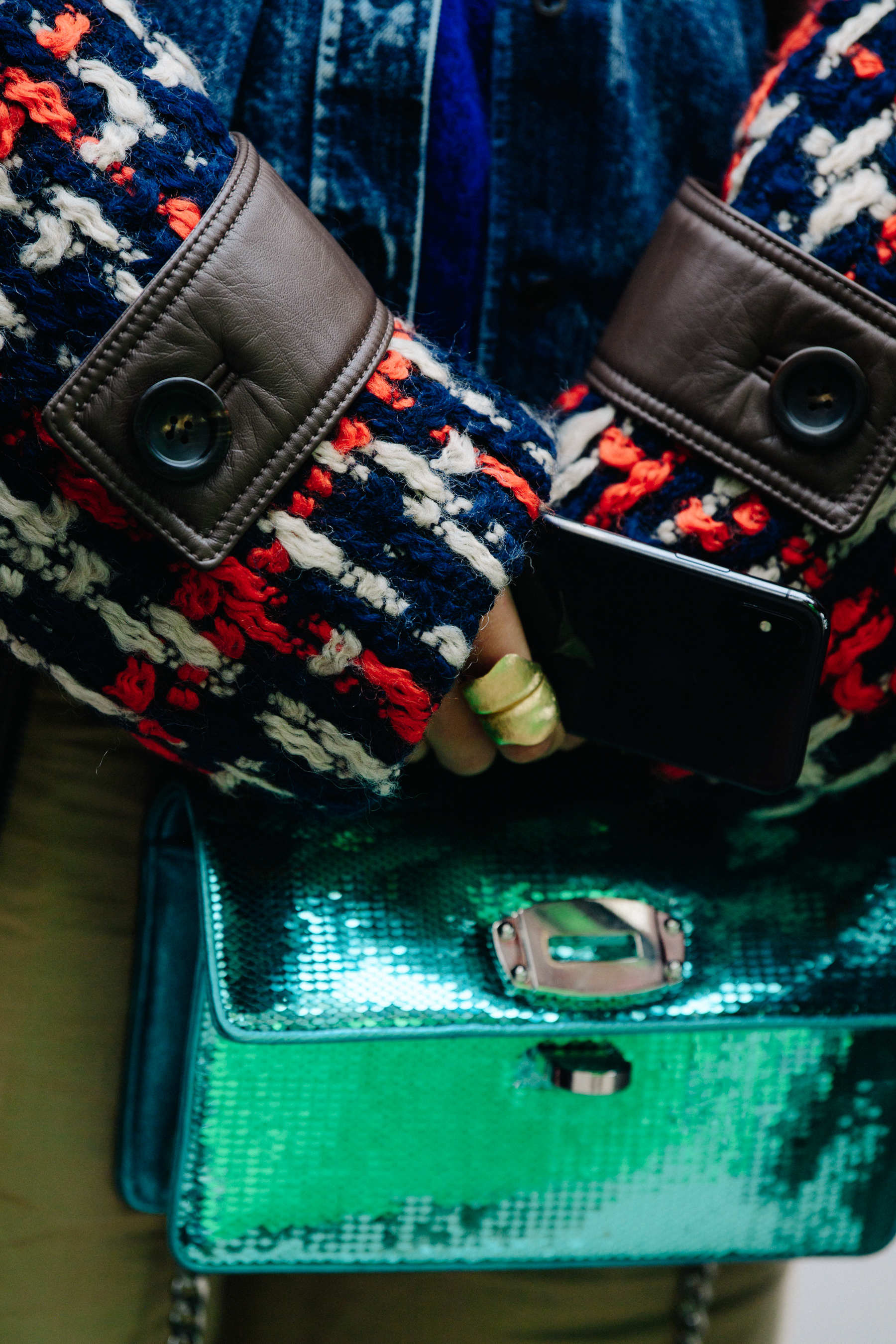 Woman carrying blue bag