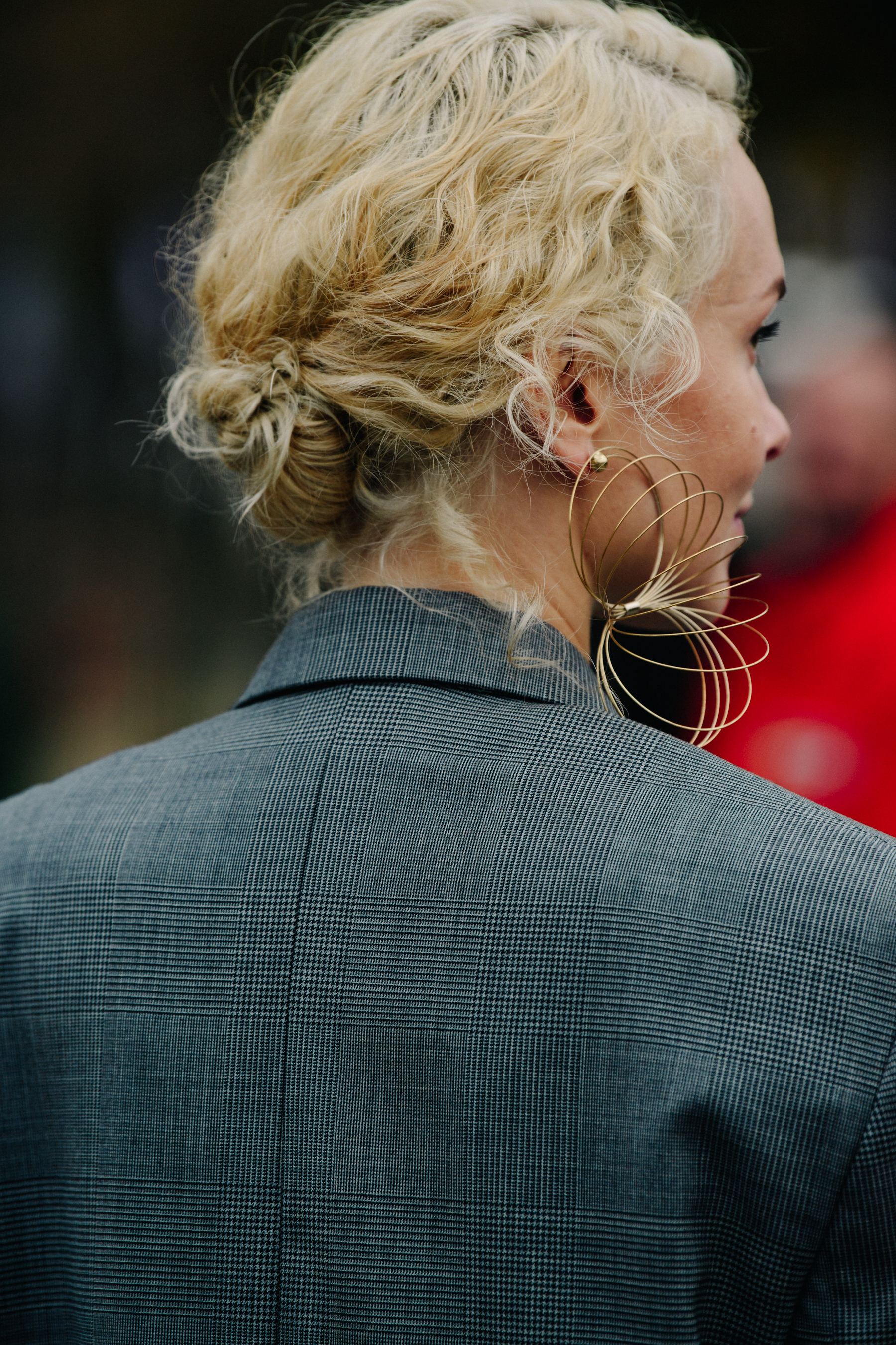 Russian buyer wearing grey suit jacket
