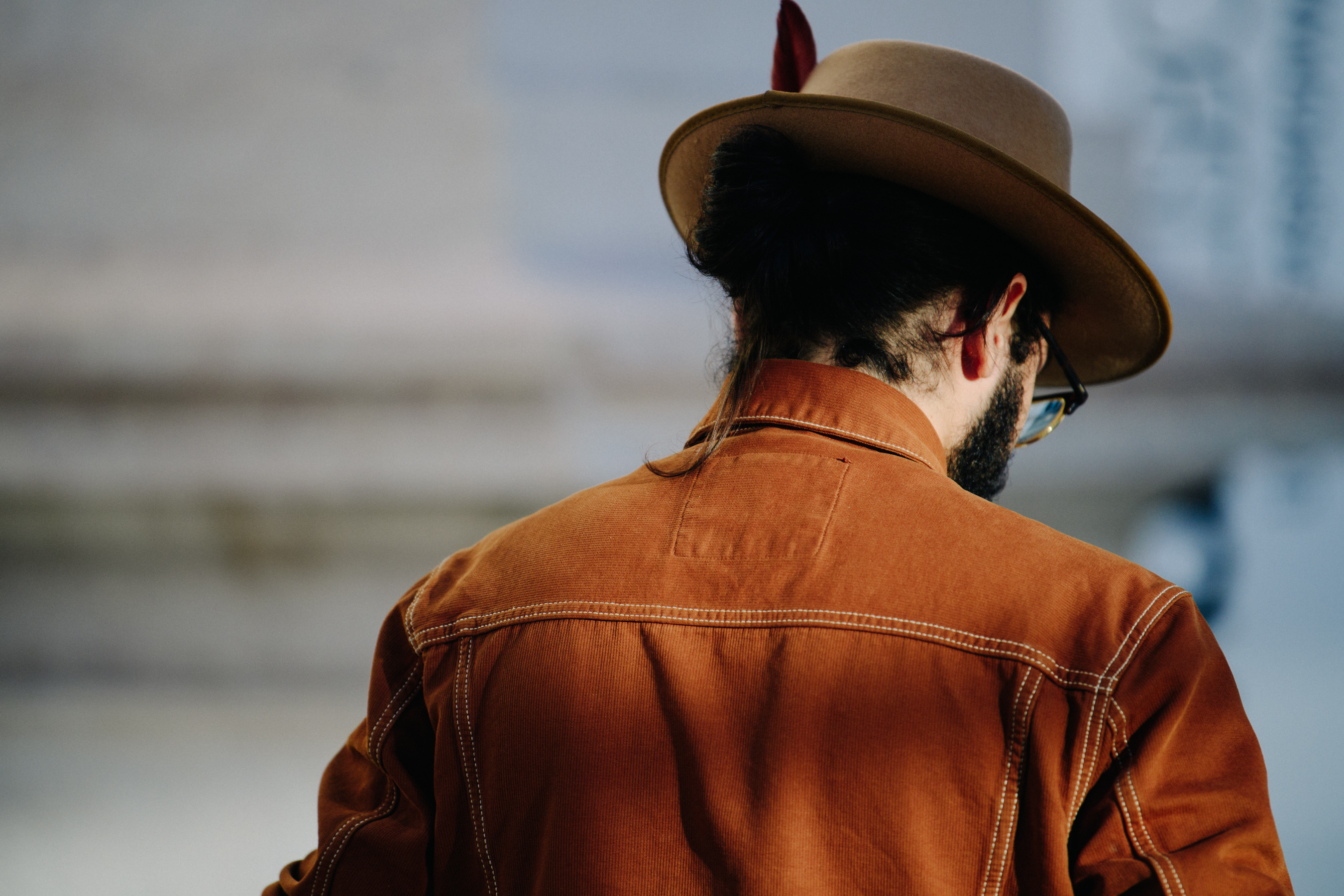 Man wearing brown corduroy jacket