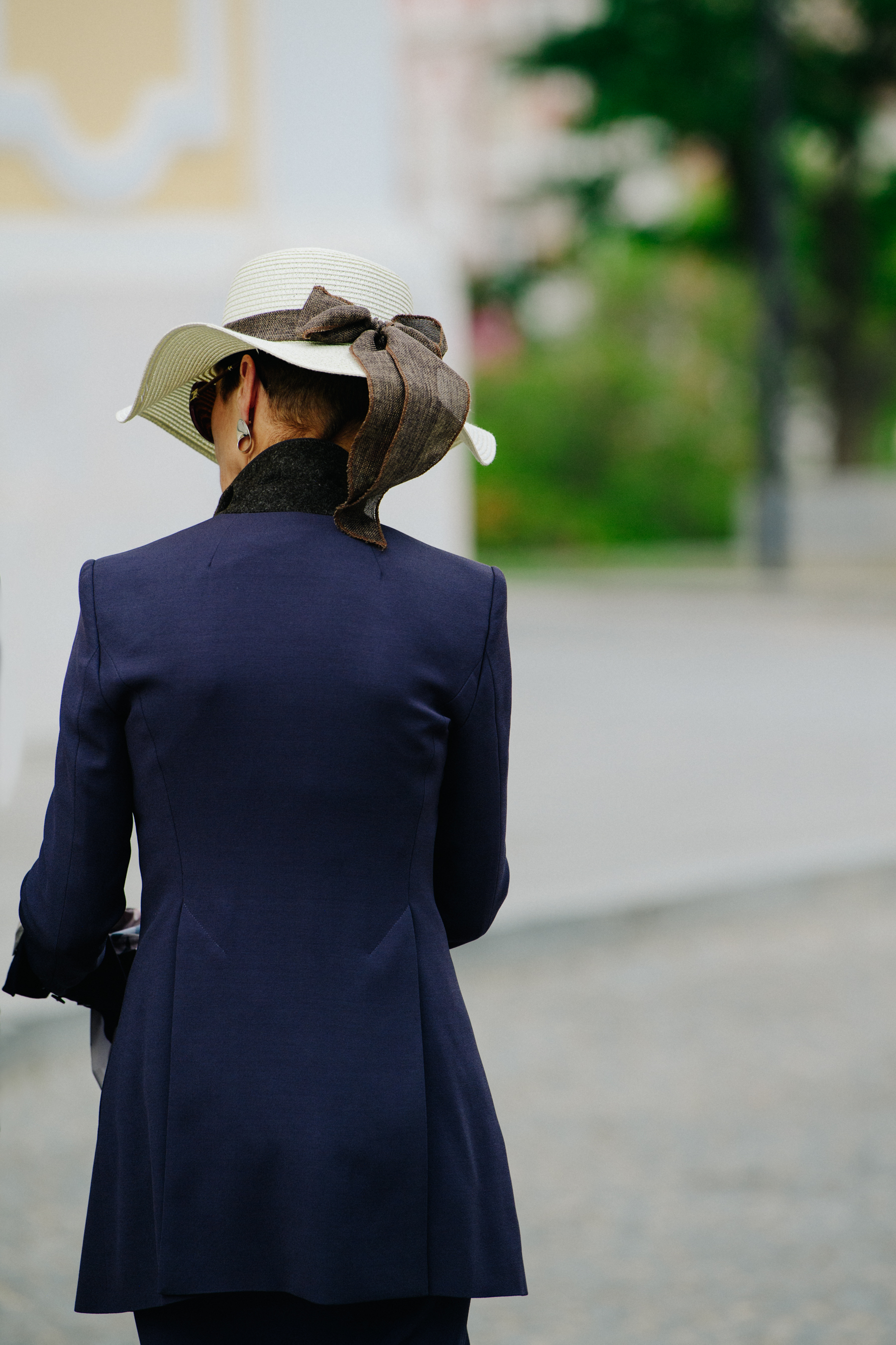 Woman wearing light wicker hat