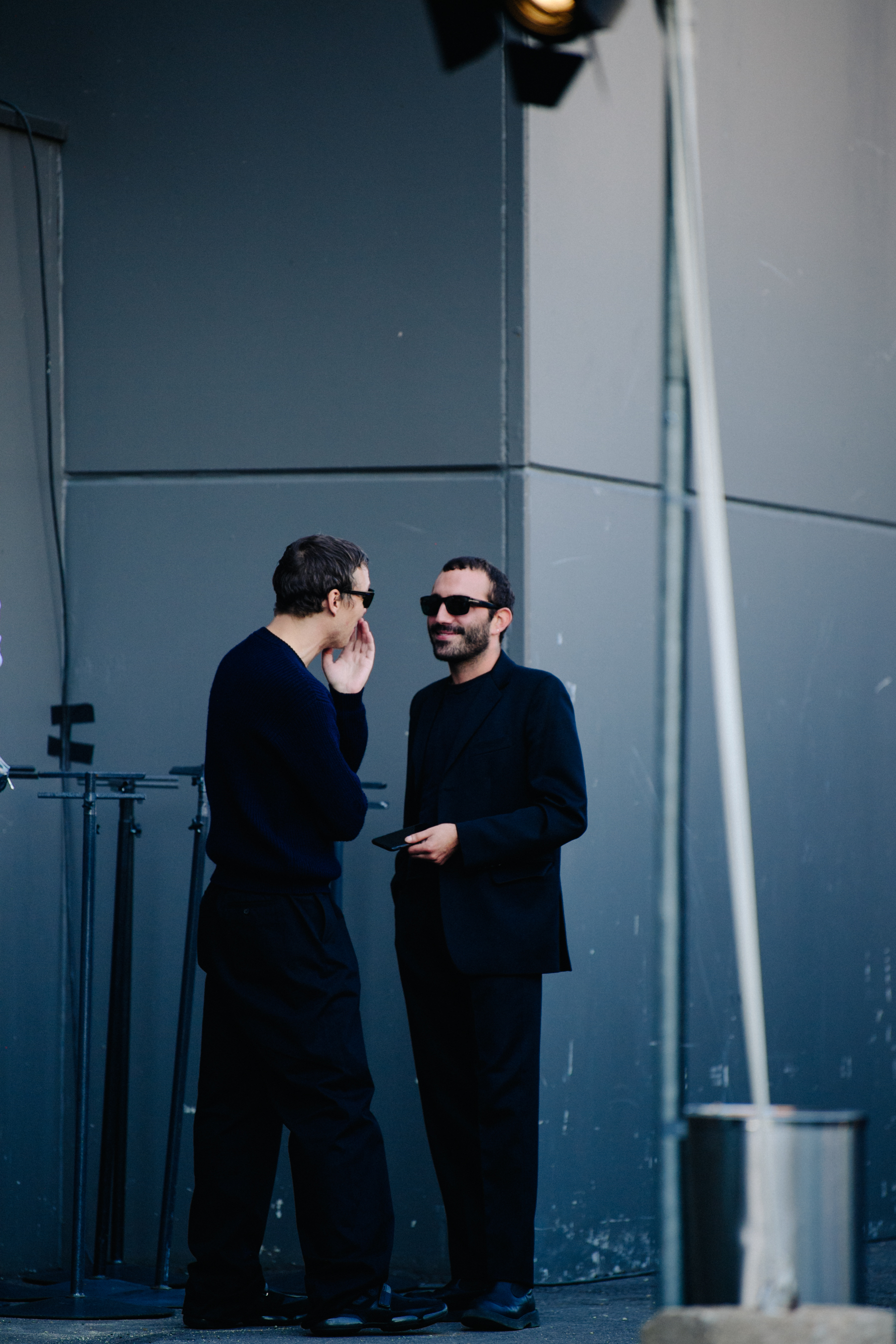 Two men wearing all black
