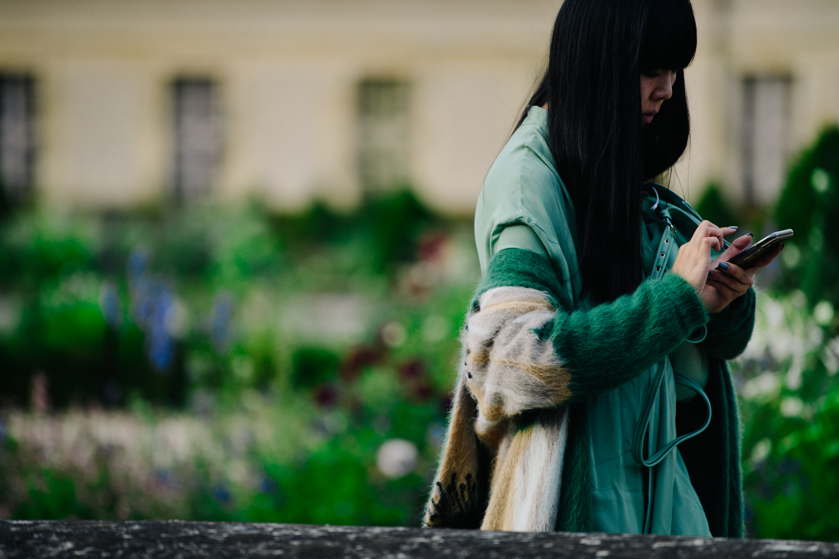 Woman wearing green jacket