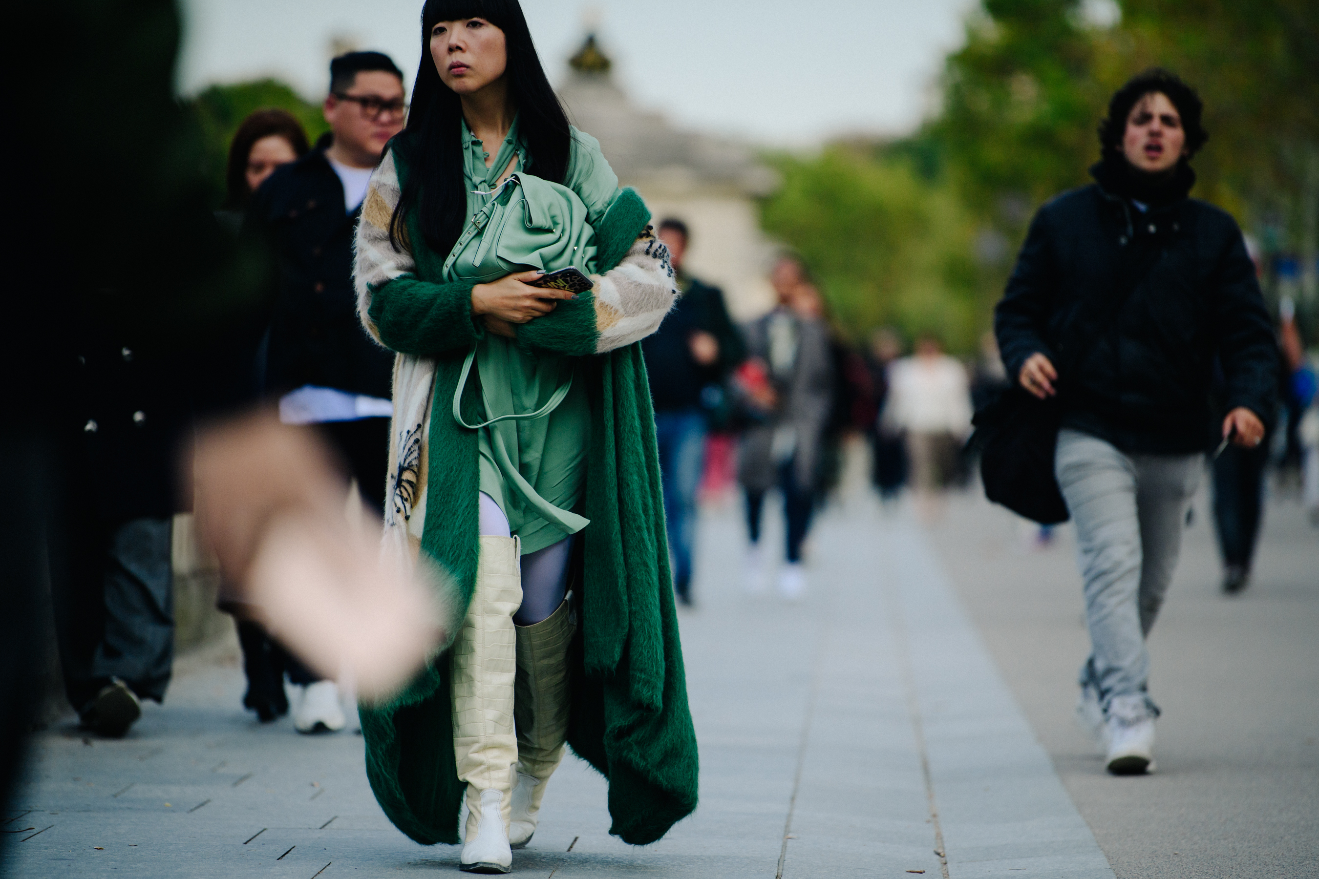 Woman wearing green jacket