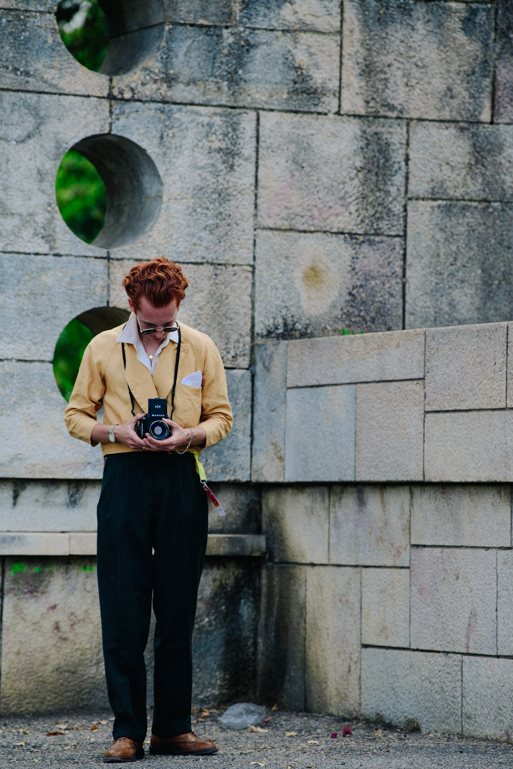 Man wearing yellow suit jacket
