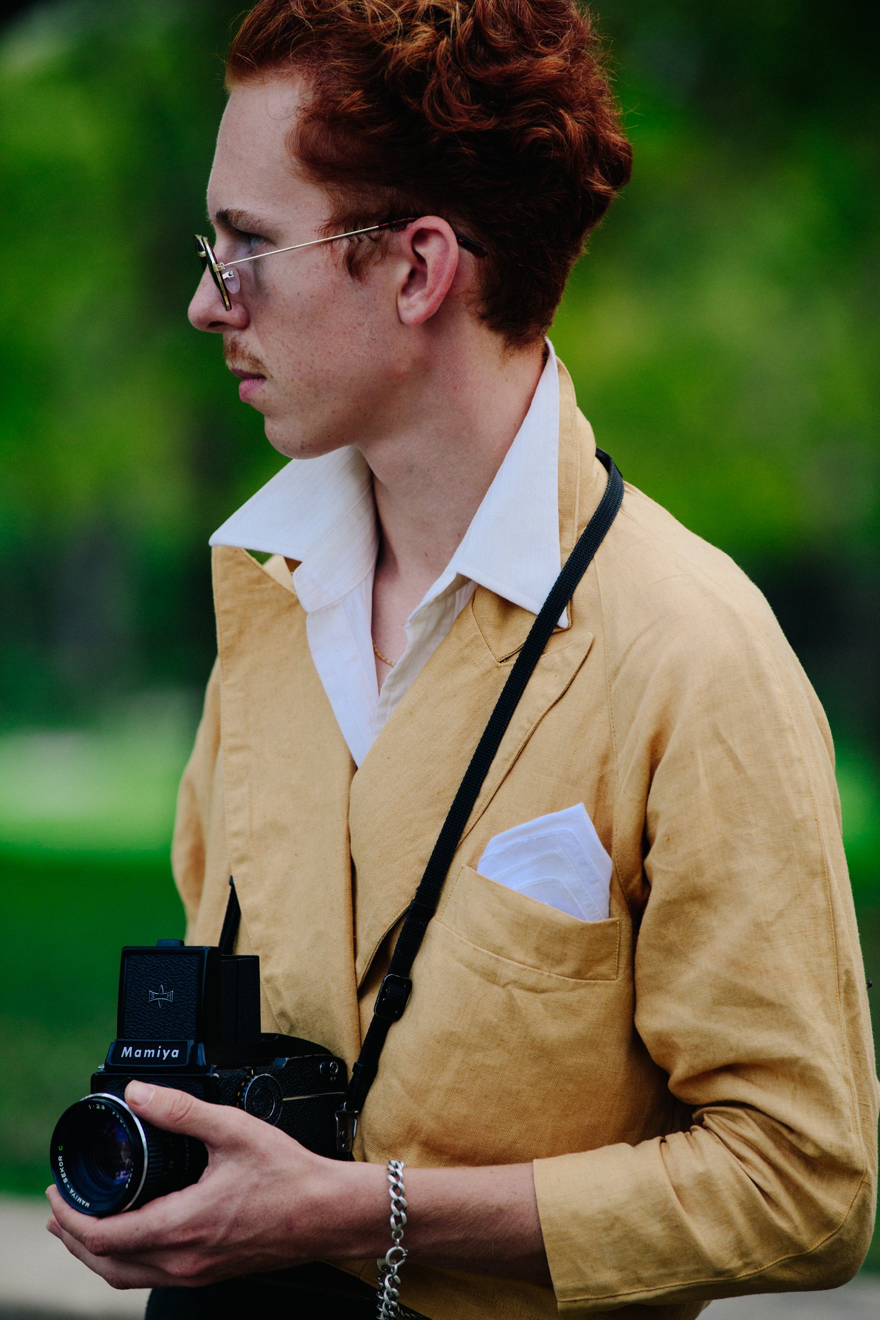 Man wearing yellow suit jacket