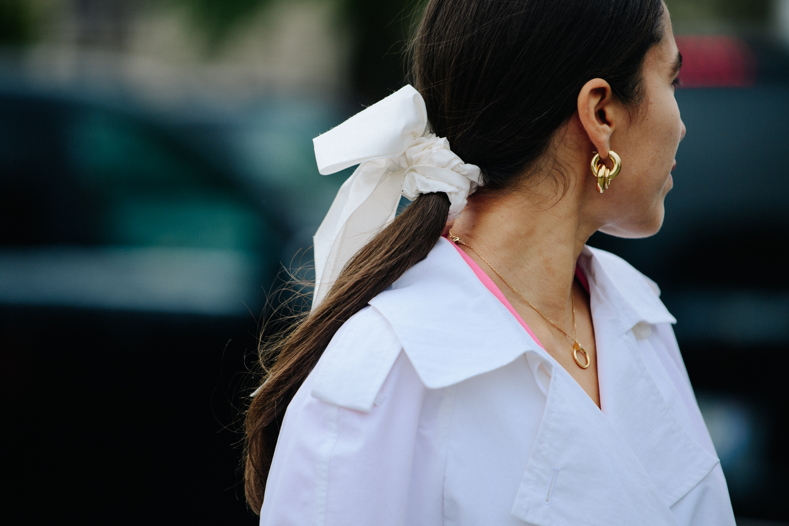 Woman wearing white hair bow