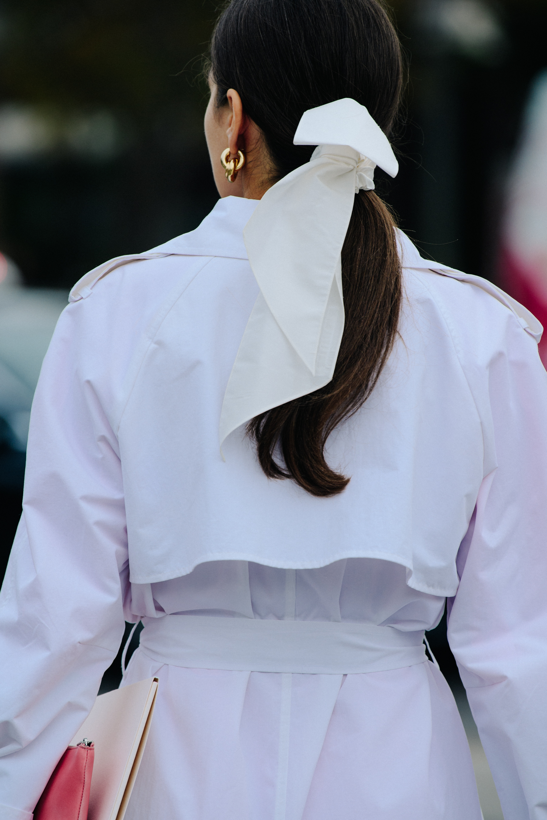 Woman wearing white coat
