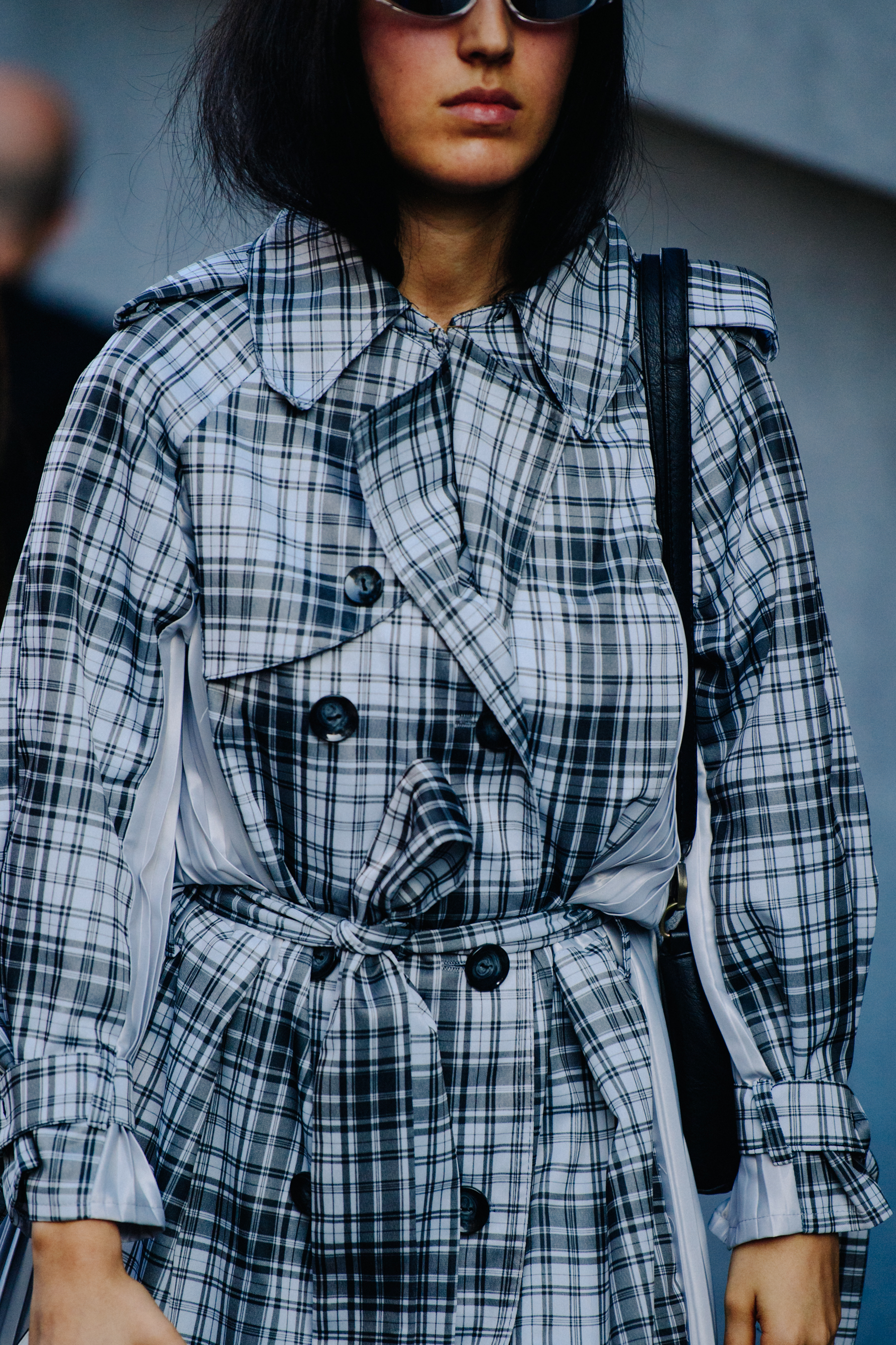 Woman wearing check coat