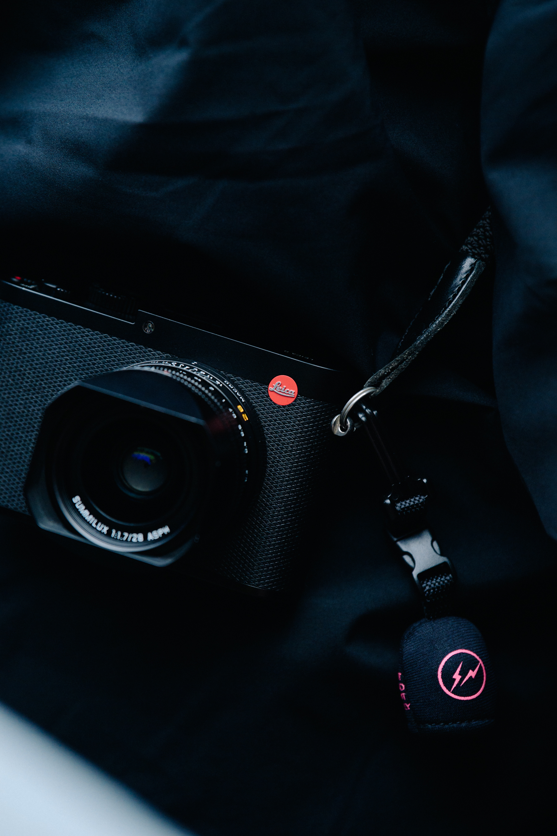 Man carrying Leica camera