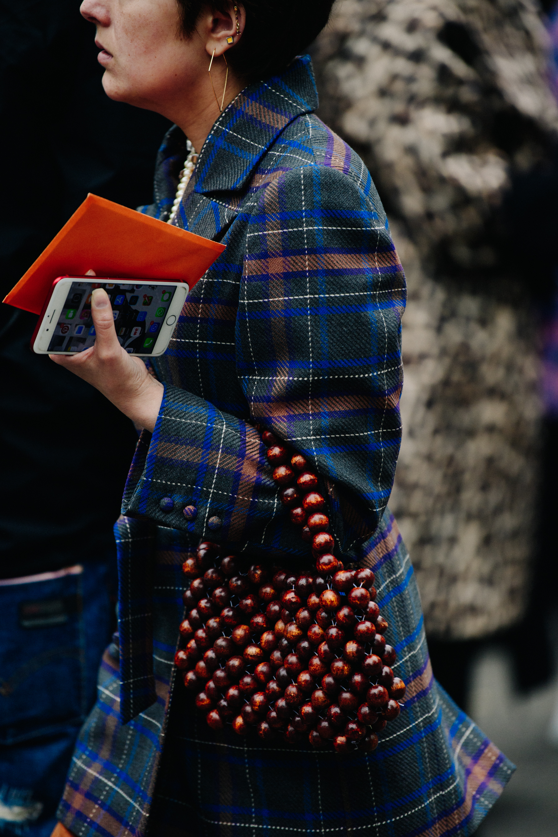Woman carrying wooden bag