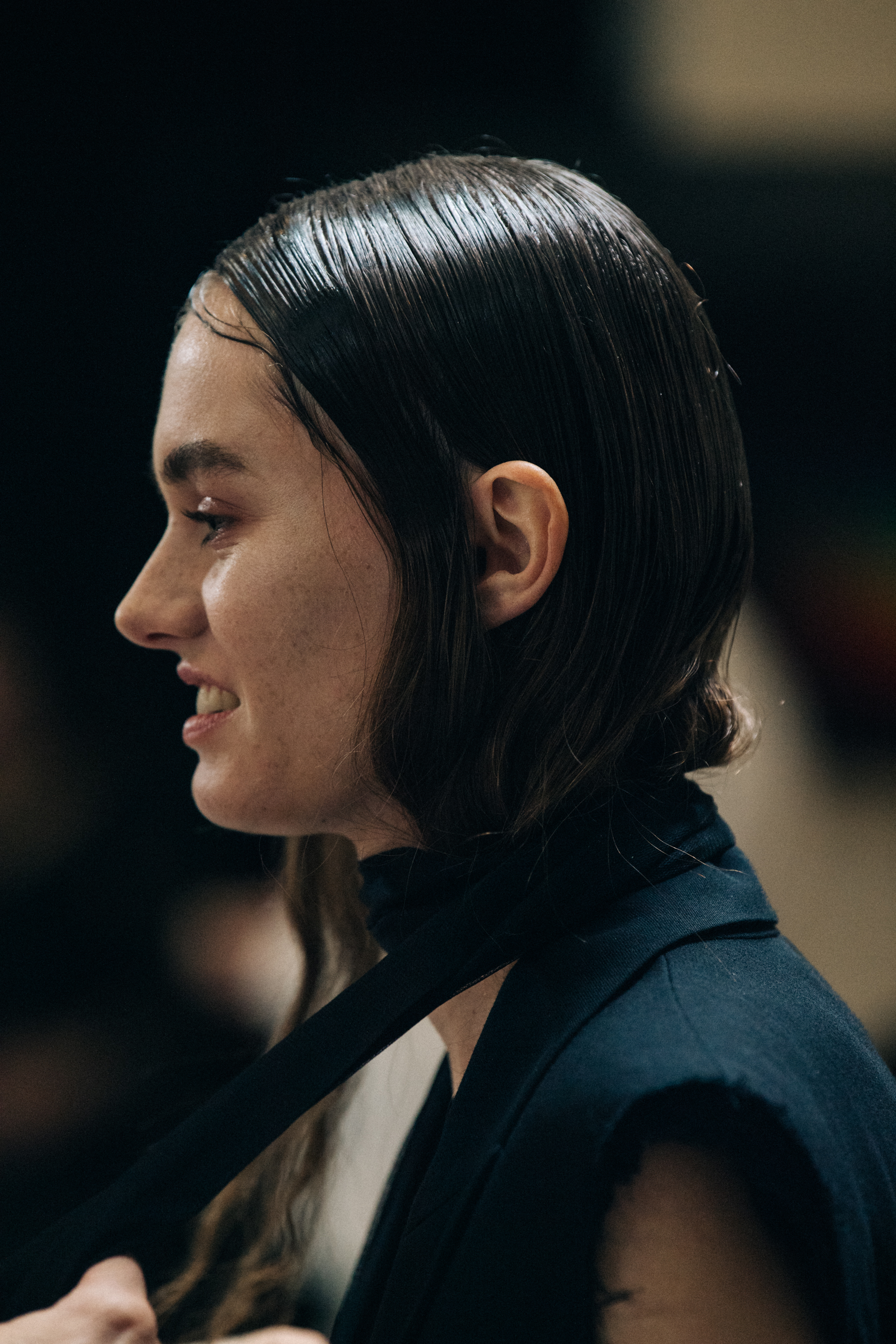 Model wearing black dress at Ann Demeulemeester