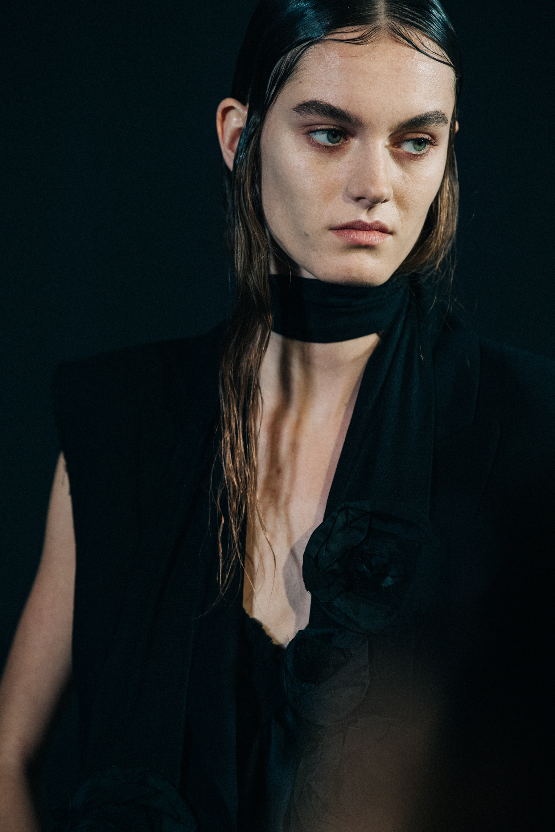 Model wearing black dress at Ann Demeulemeester