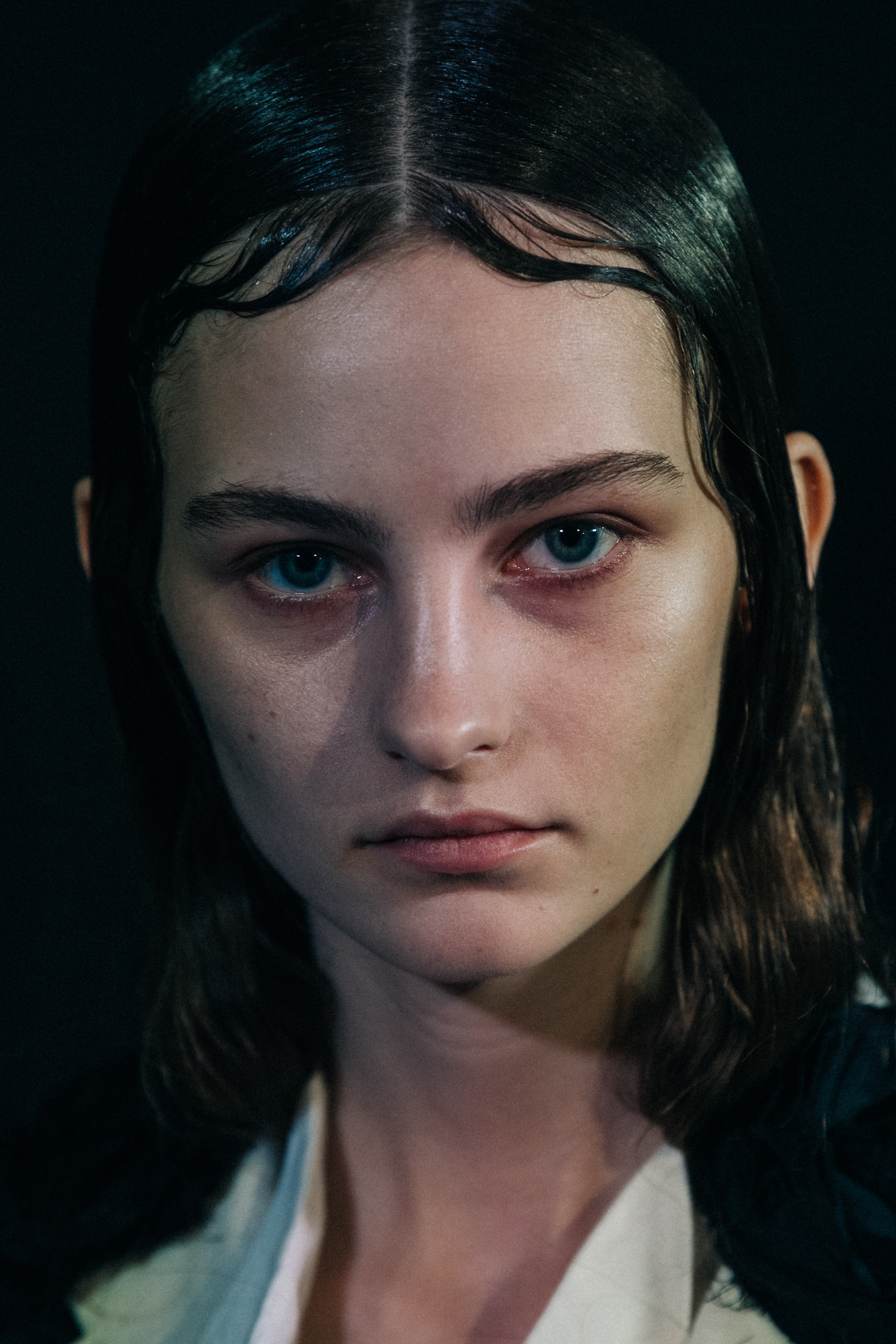 Portrait of model with wet look hair