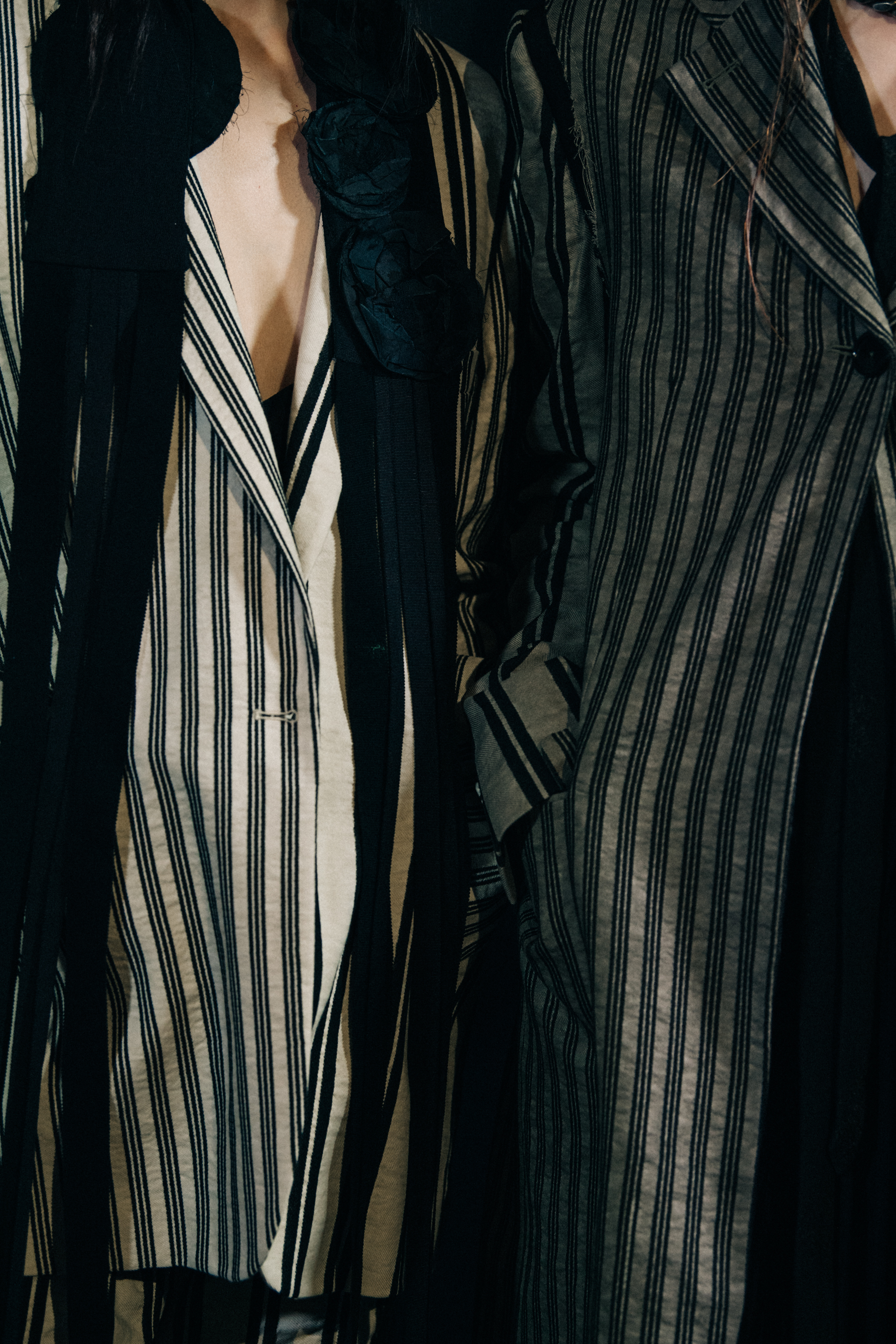 Models wearing striped suits at Ann Demeulemeester