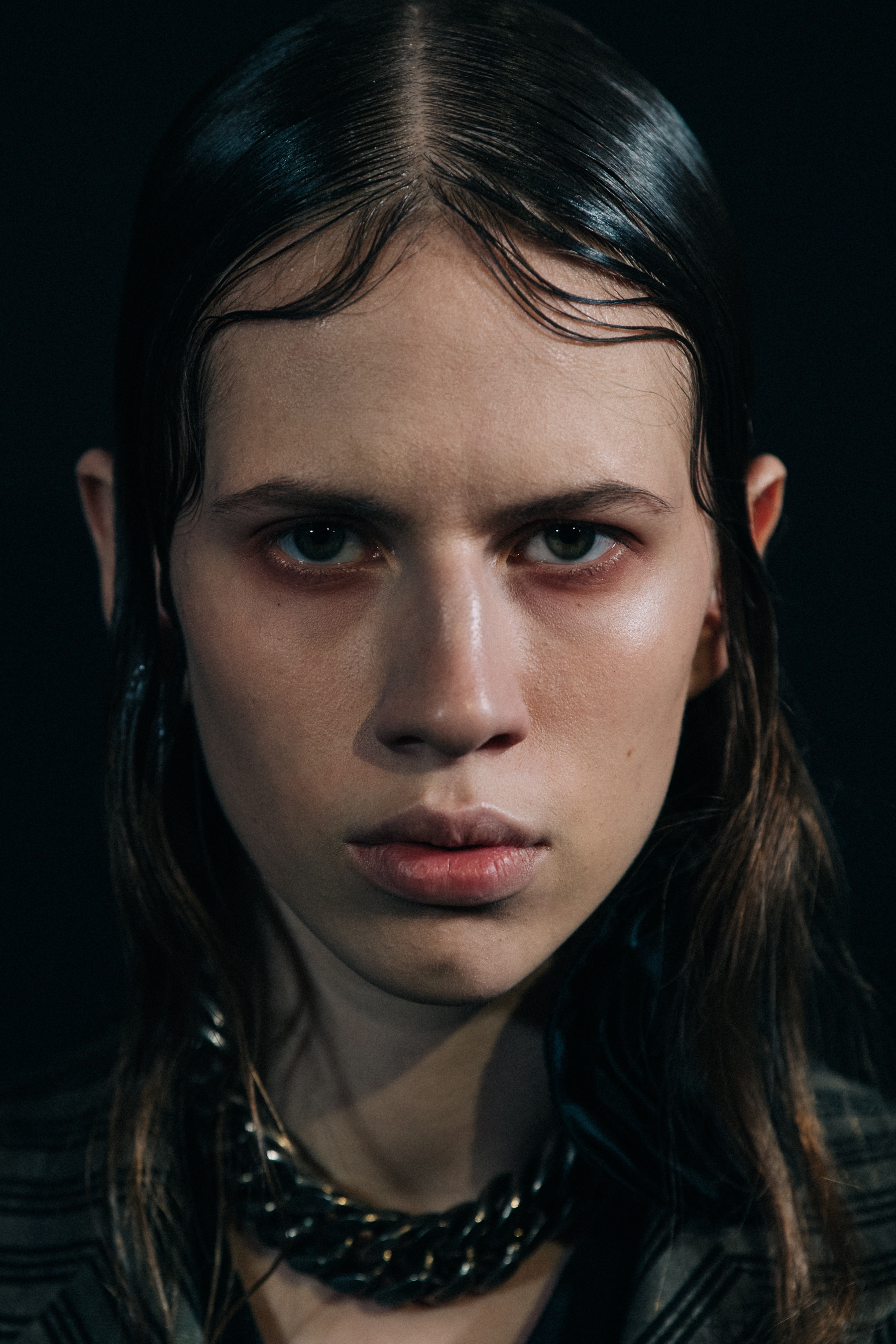 Portrait of model with wet look hair